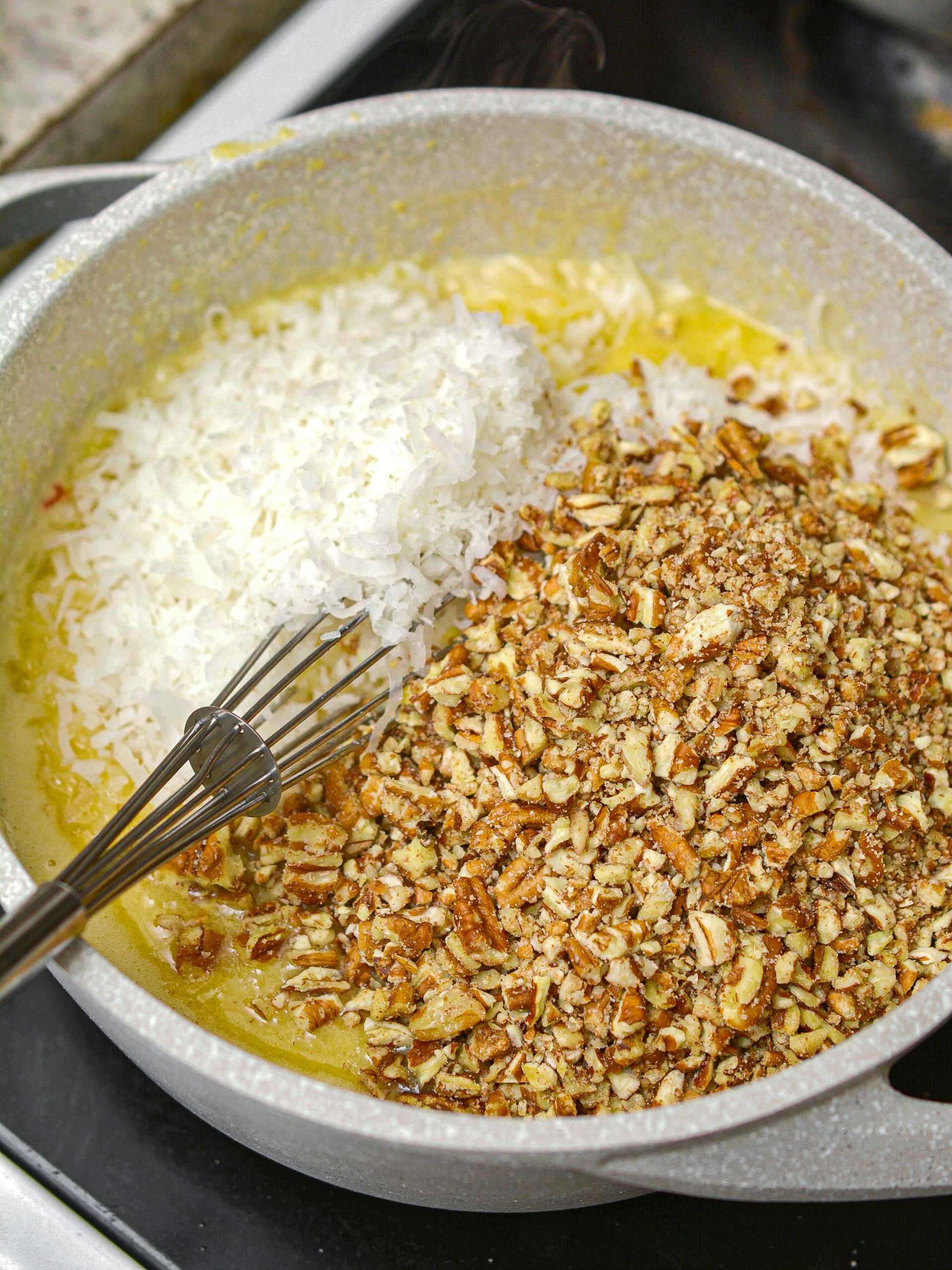 Stir in the coconut and pecans.