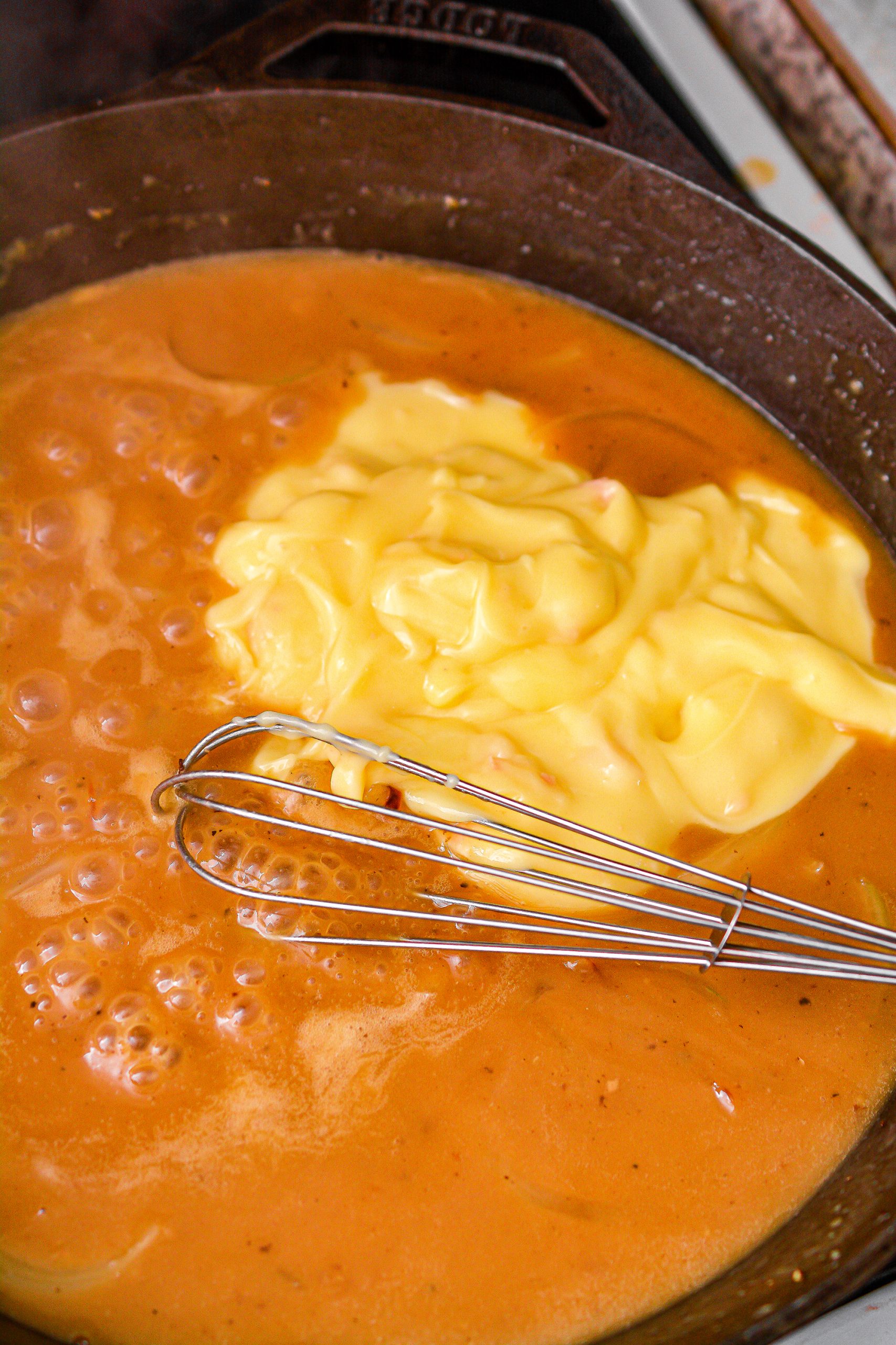 Pour the soup into the skillet, and whisk to combine.