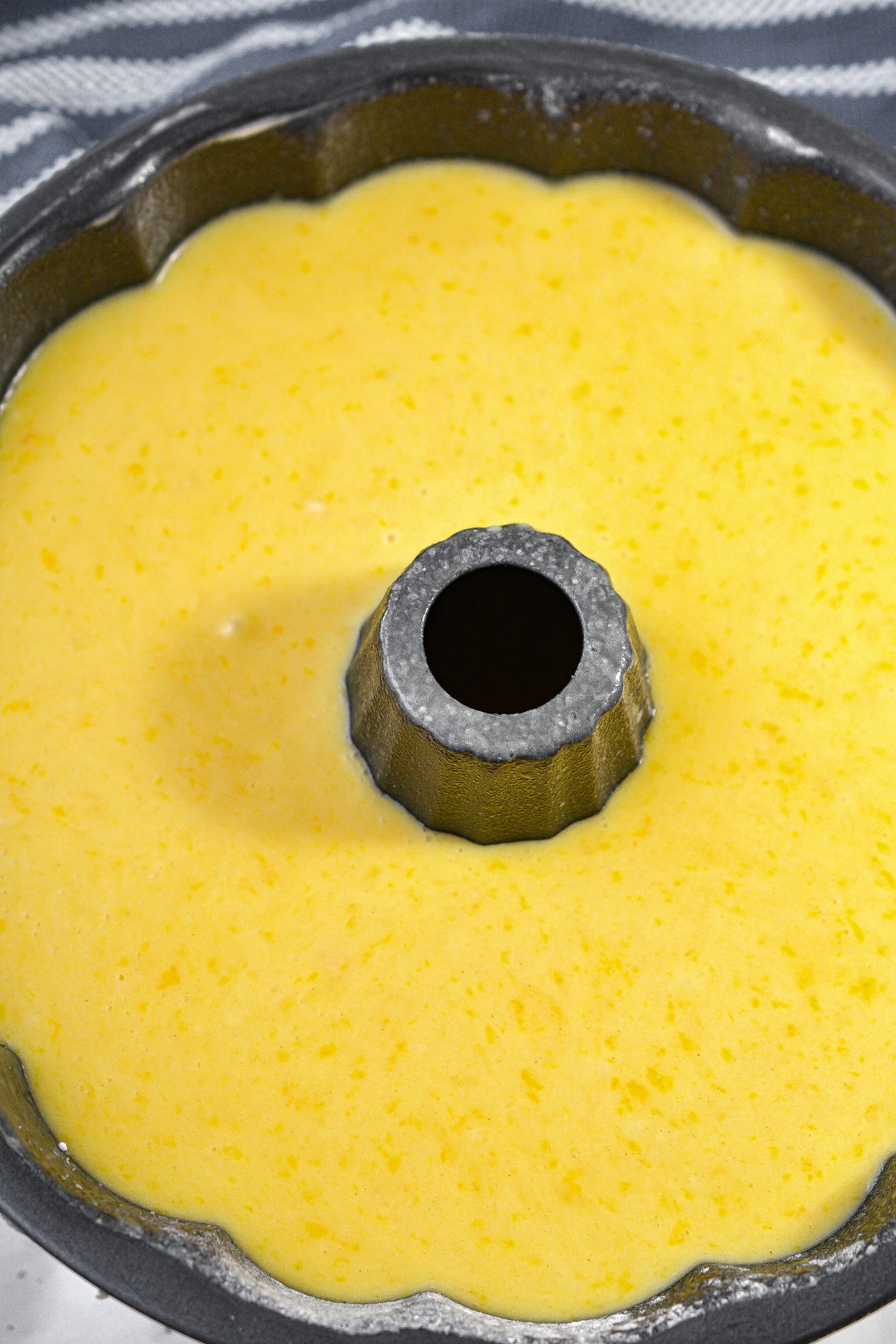 Pour the mixture into a well greased and floured bundt pan.
