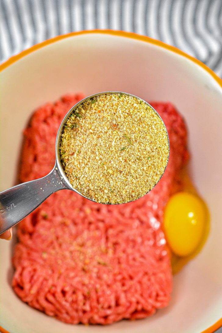 combine 1 lb of ground beef, ¼ cup of breadcrumbs, and 1 large egg