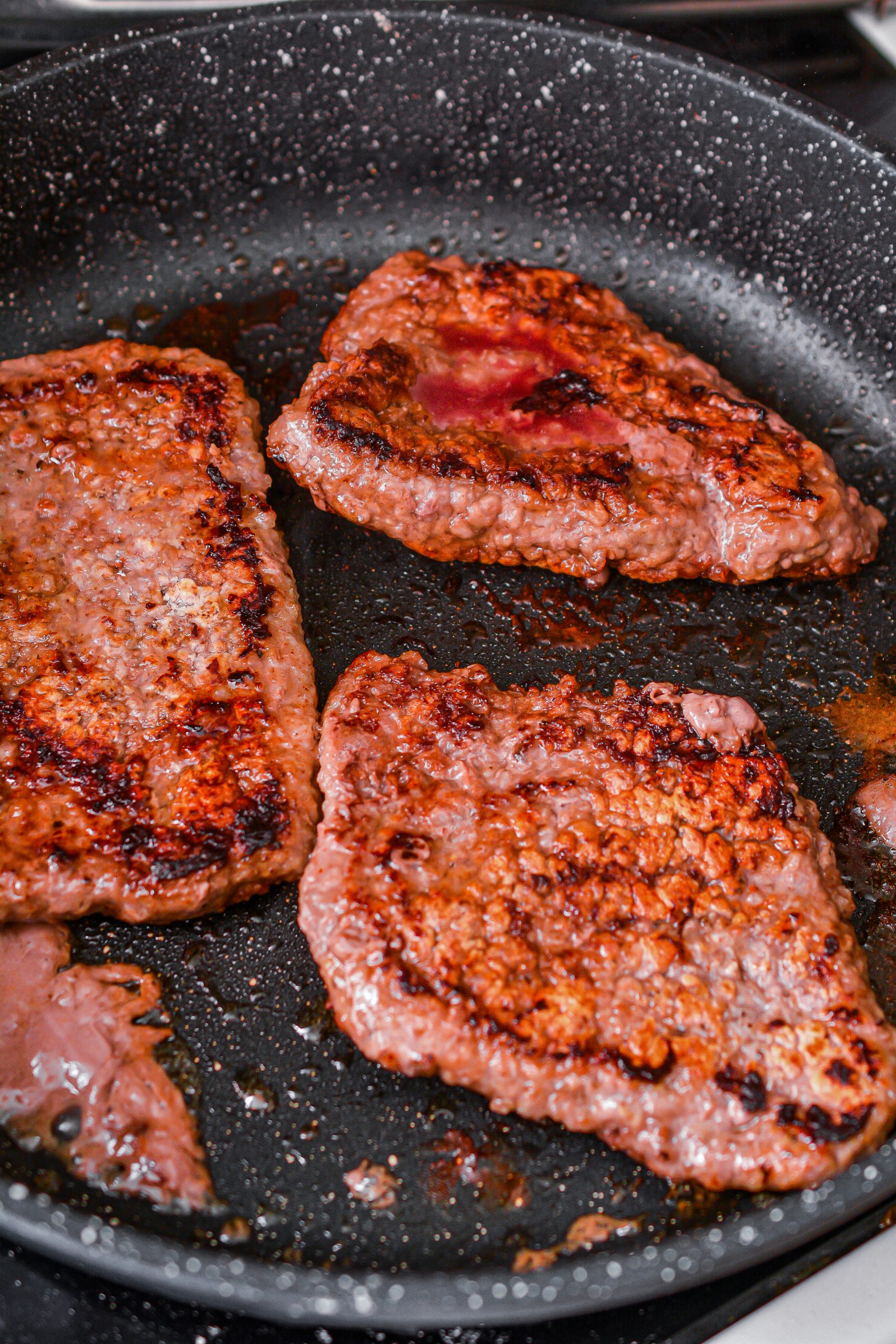 Add the steak to the heated skillet and sear on both sides evenly, cooking until your desired doneness has been reached. Set aside on a plate.