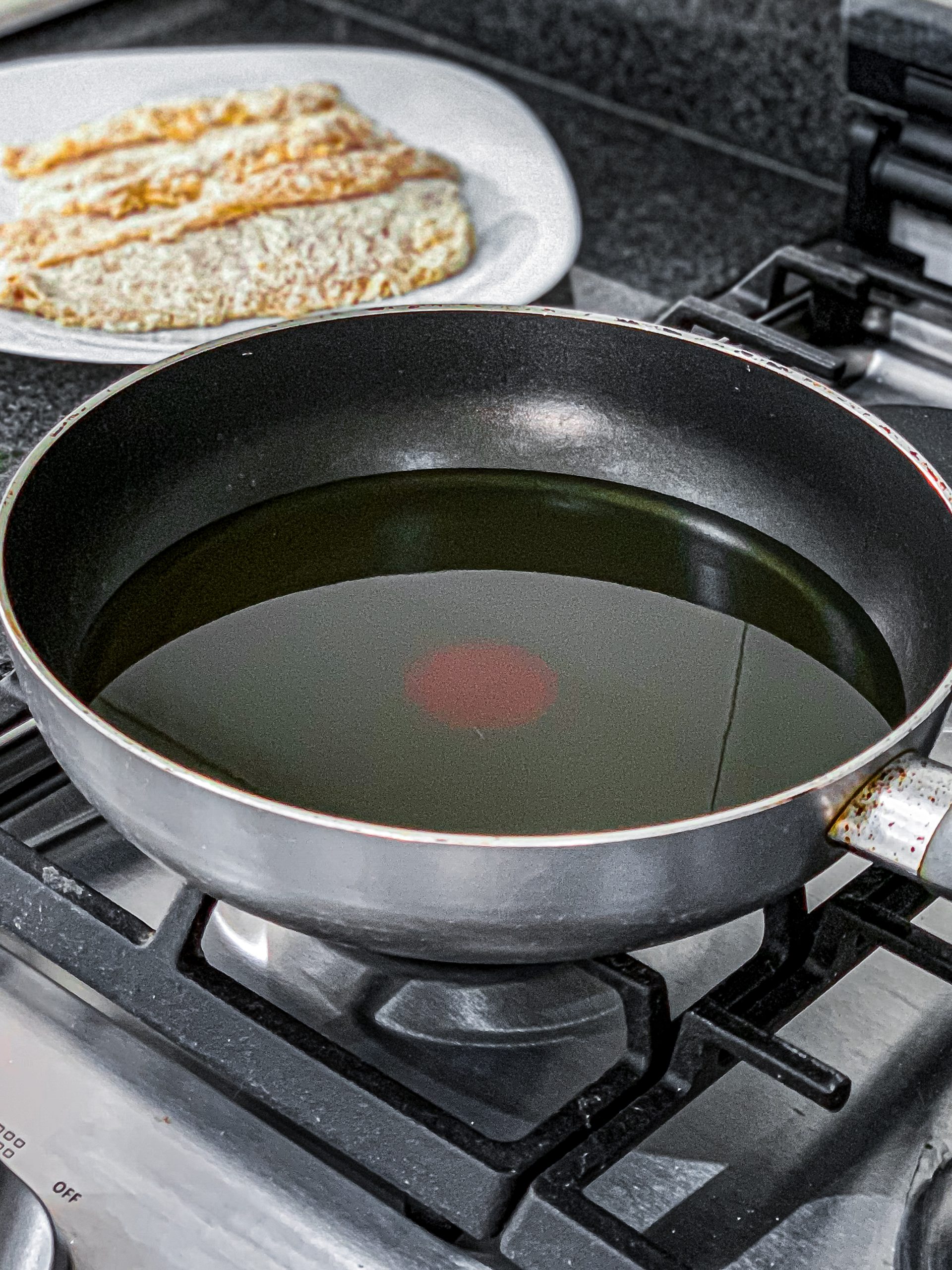 In a large skillet add oil and heat to medium-low.