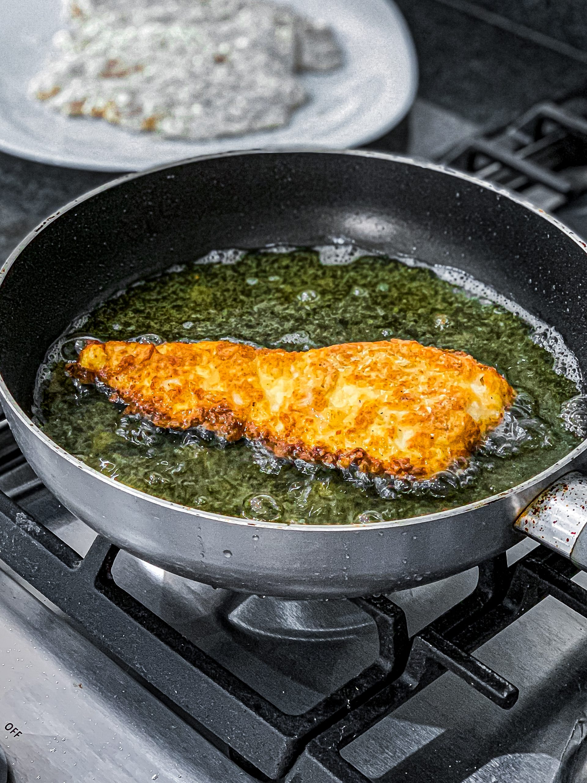 Carefully add each chicken piece at a time and fry for about 3 to 5 minutes per side or until golden brown.