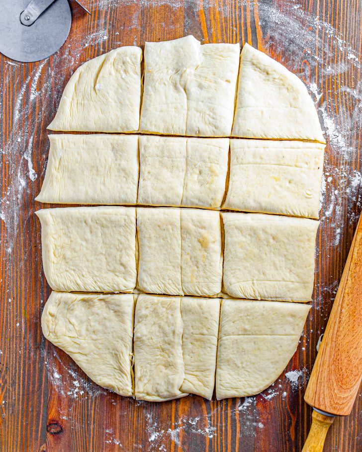 Cut the dough into 12 even rectangular shapes.