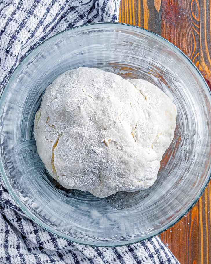 Flour the dough slightly, and turn it into a ball in a well-greased large mixing bowl.