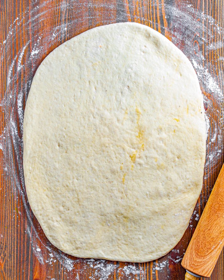 Place the dough onto a floured surface, and roll it out until it is ½ inch thick.
