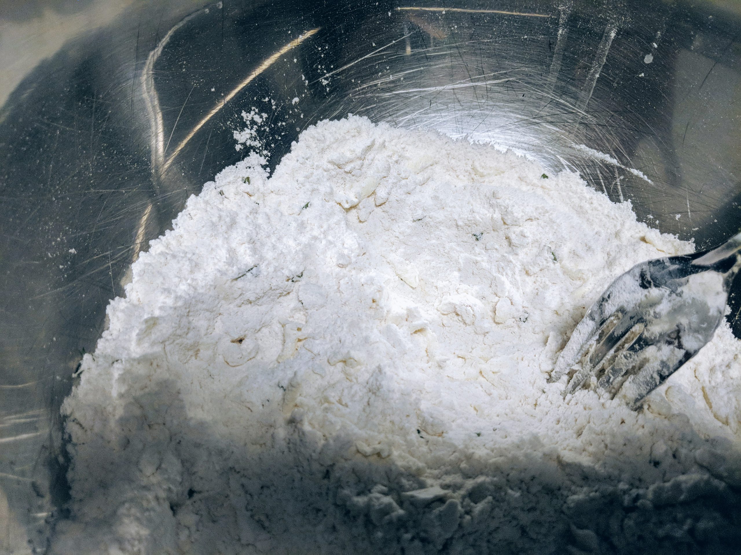 Incorporate the cold butter into the flour mixture until it resembles coarse crumbs. 