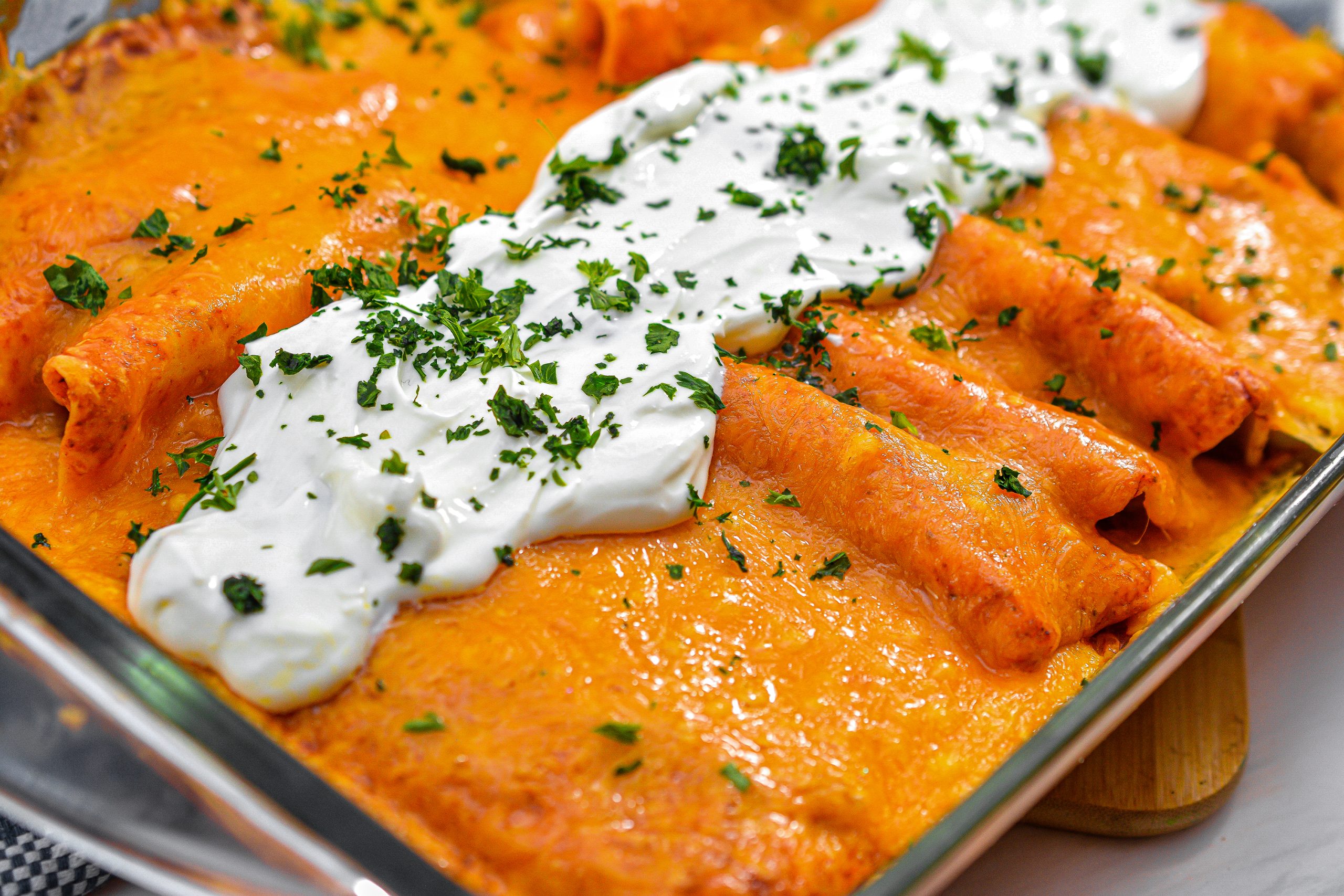 Bake for 20 minutes and garnish with sour cream and cilantro before serving