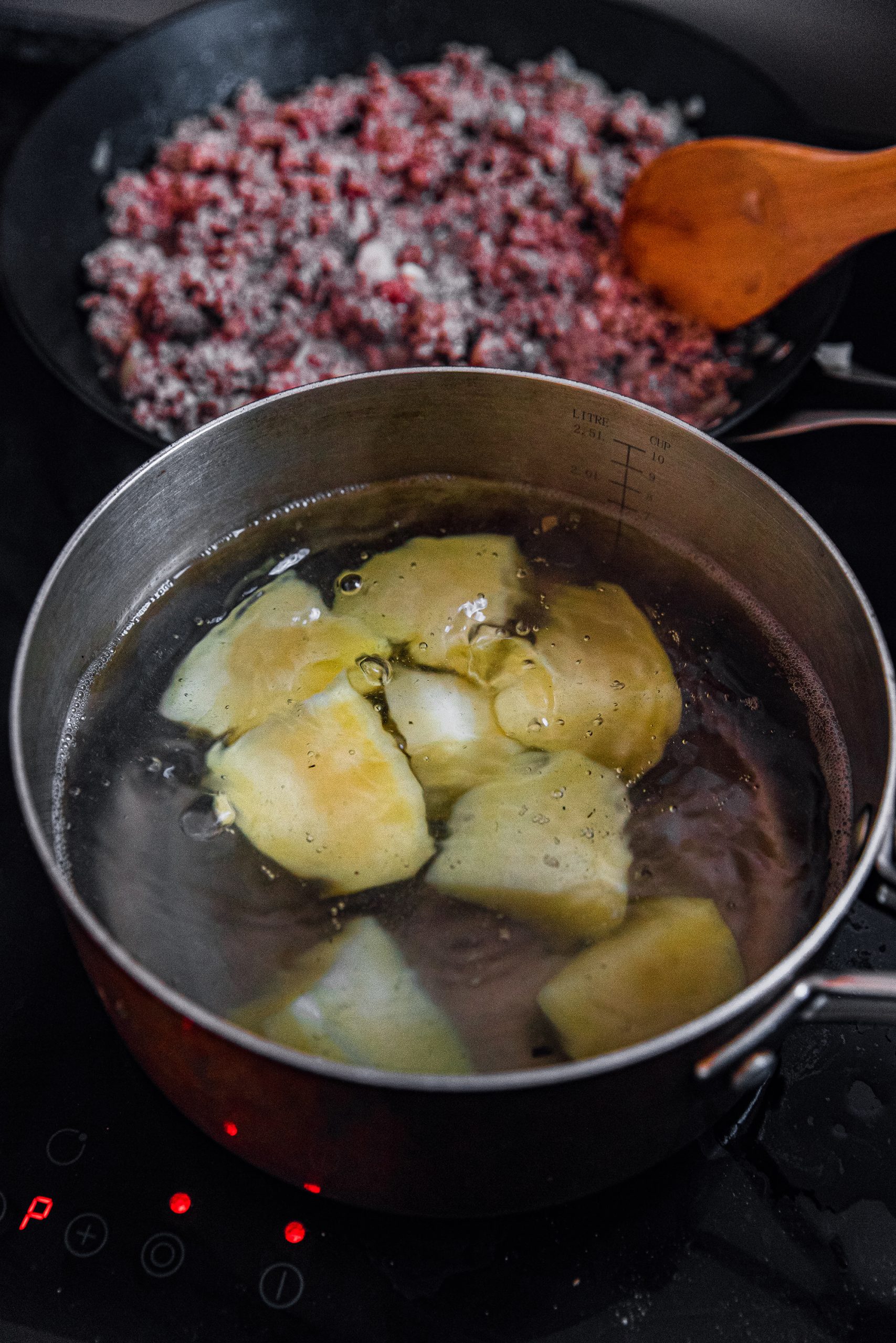 Boil the potatoes in a saucepan with water until soft. 
