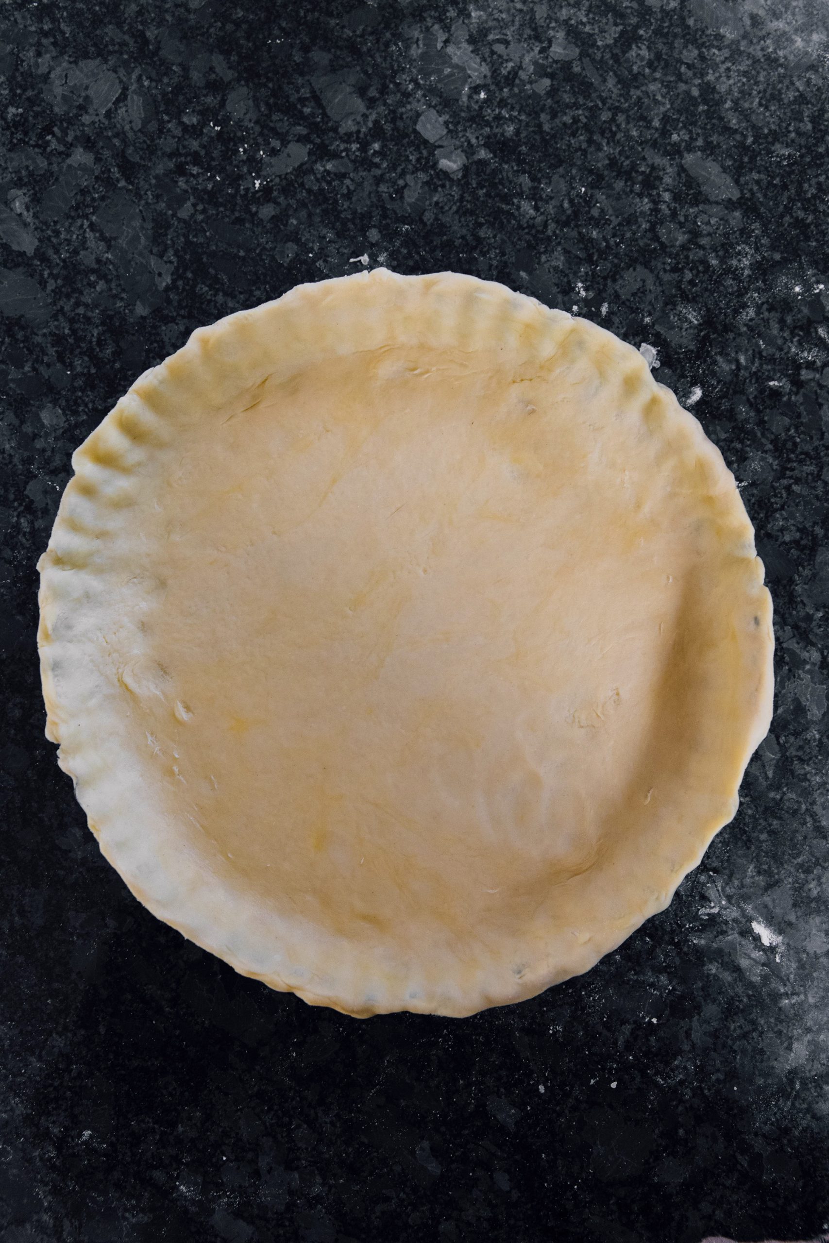 Roll into an 11-inch circle and place on a floured surface. Fill every circle with the meat mixture and cover with the remaining pastry. Seal the edges very well and bake at 450°F/235°C for 20 minutes. 