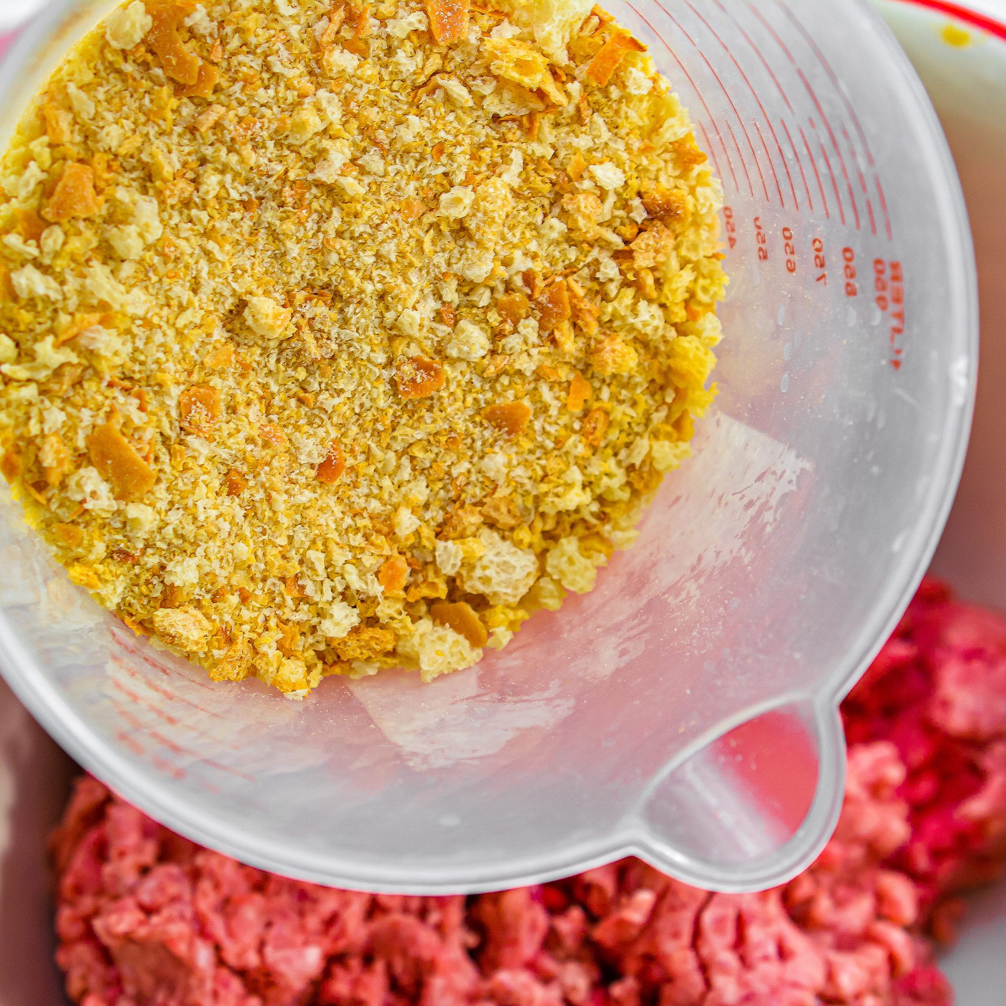 In a mixing bowl, combine the ground beef, ground pork, parmesan cheese, garlic, parsley, bread crumbs, eggs, and salt and pepper to taste.