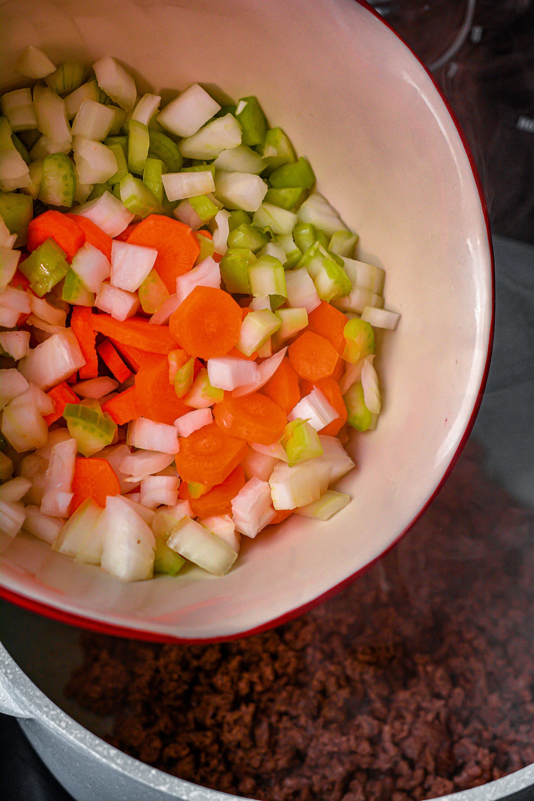 Add carrots, celery, and onions, all chopped.