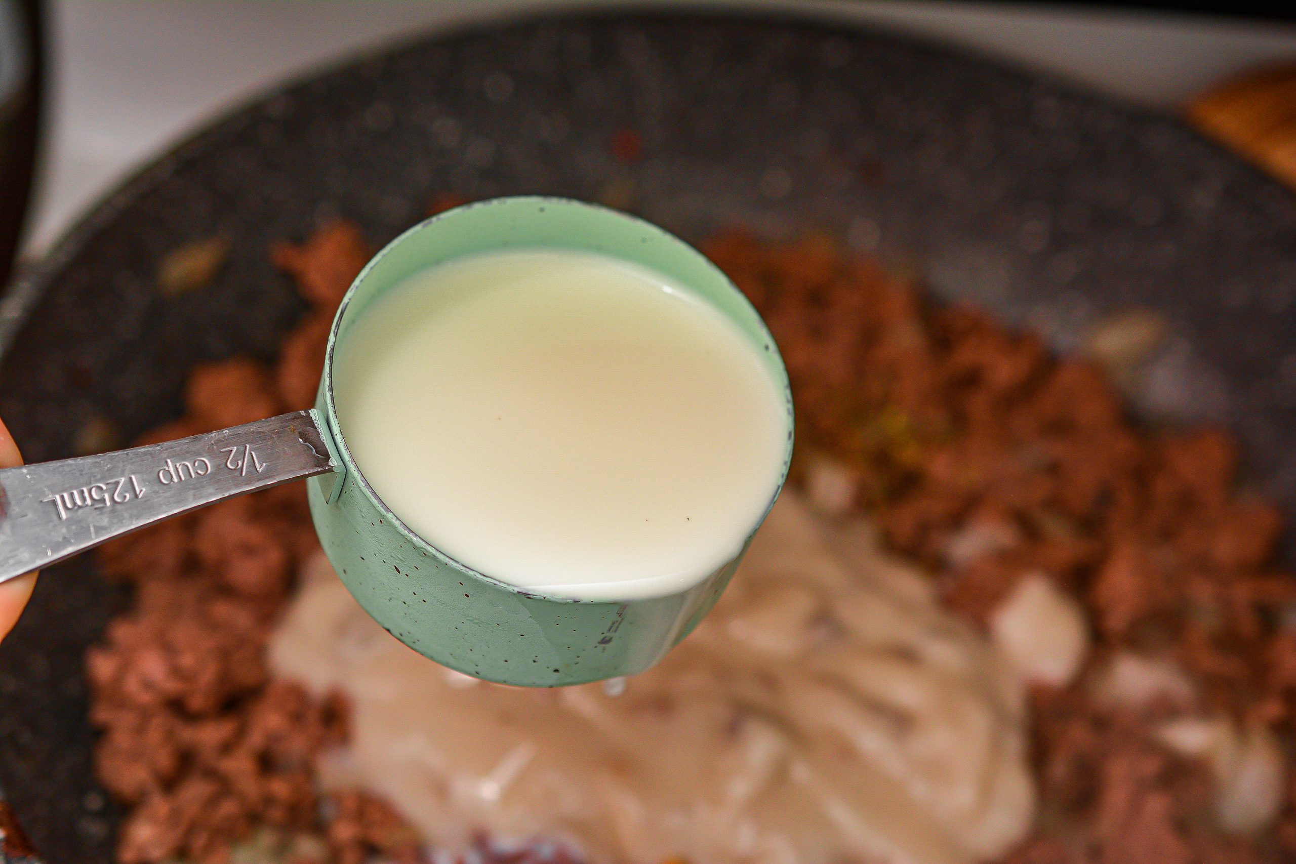 Then, add ½ cup of milk.