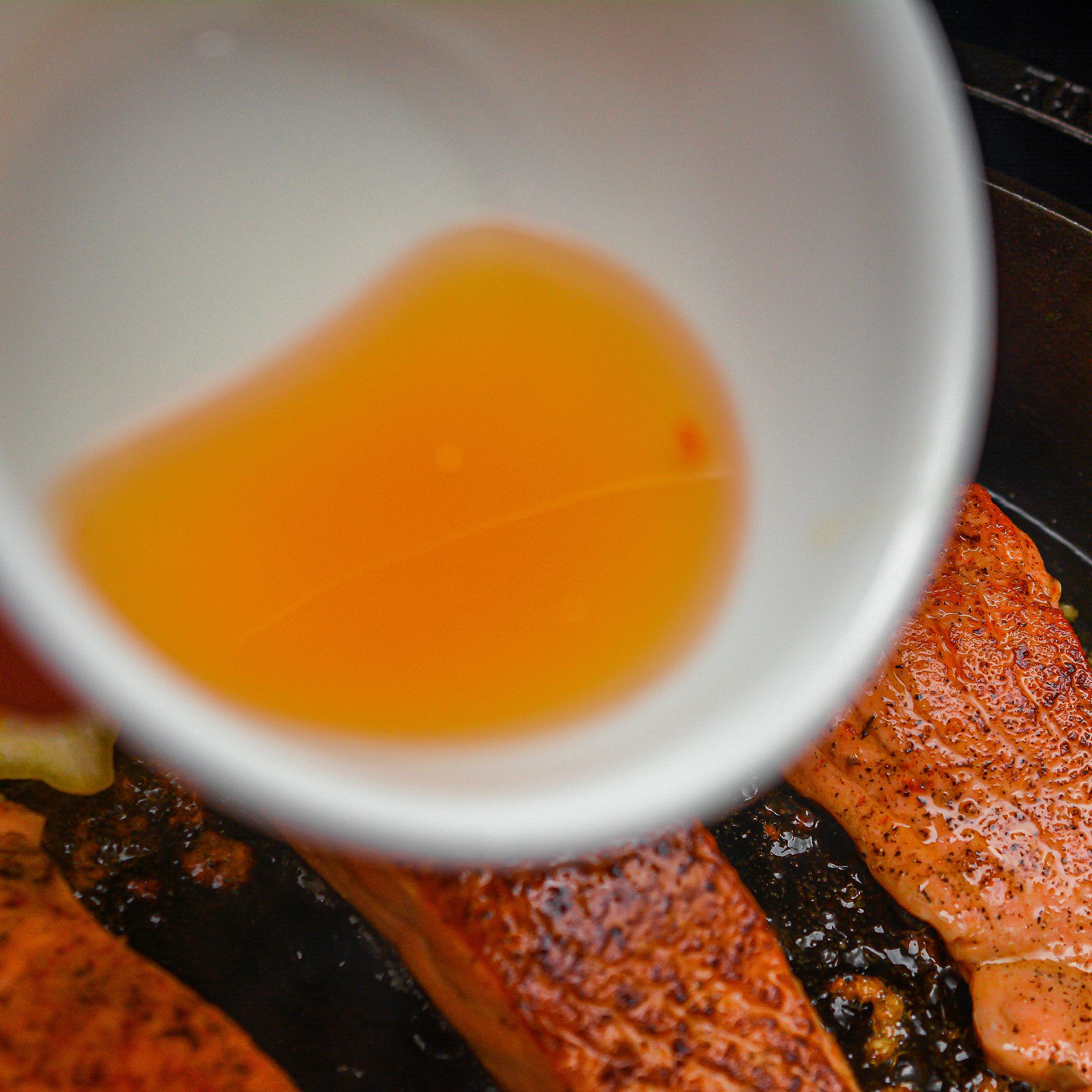 Pour the honey mixture into the skillet until the sauce gets sticky.