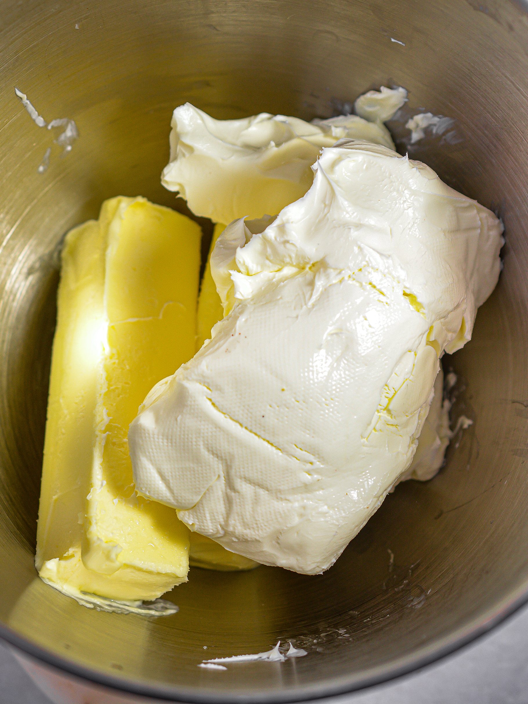 Add the softened cream cheese and butter. 