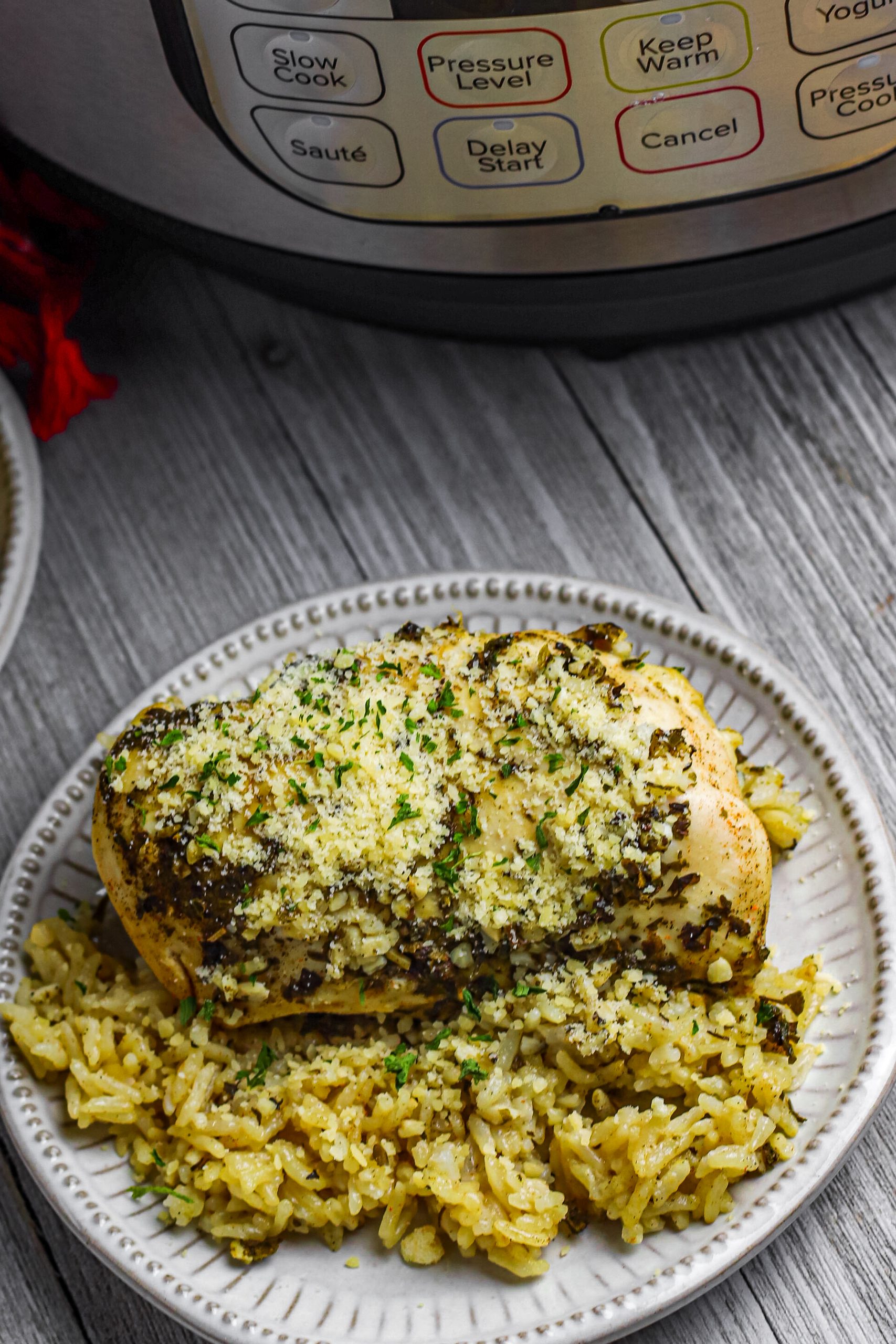 Serve the chicken over the rice and top with grated parmesan cheese (optional).