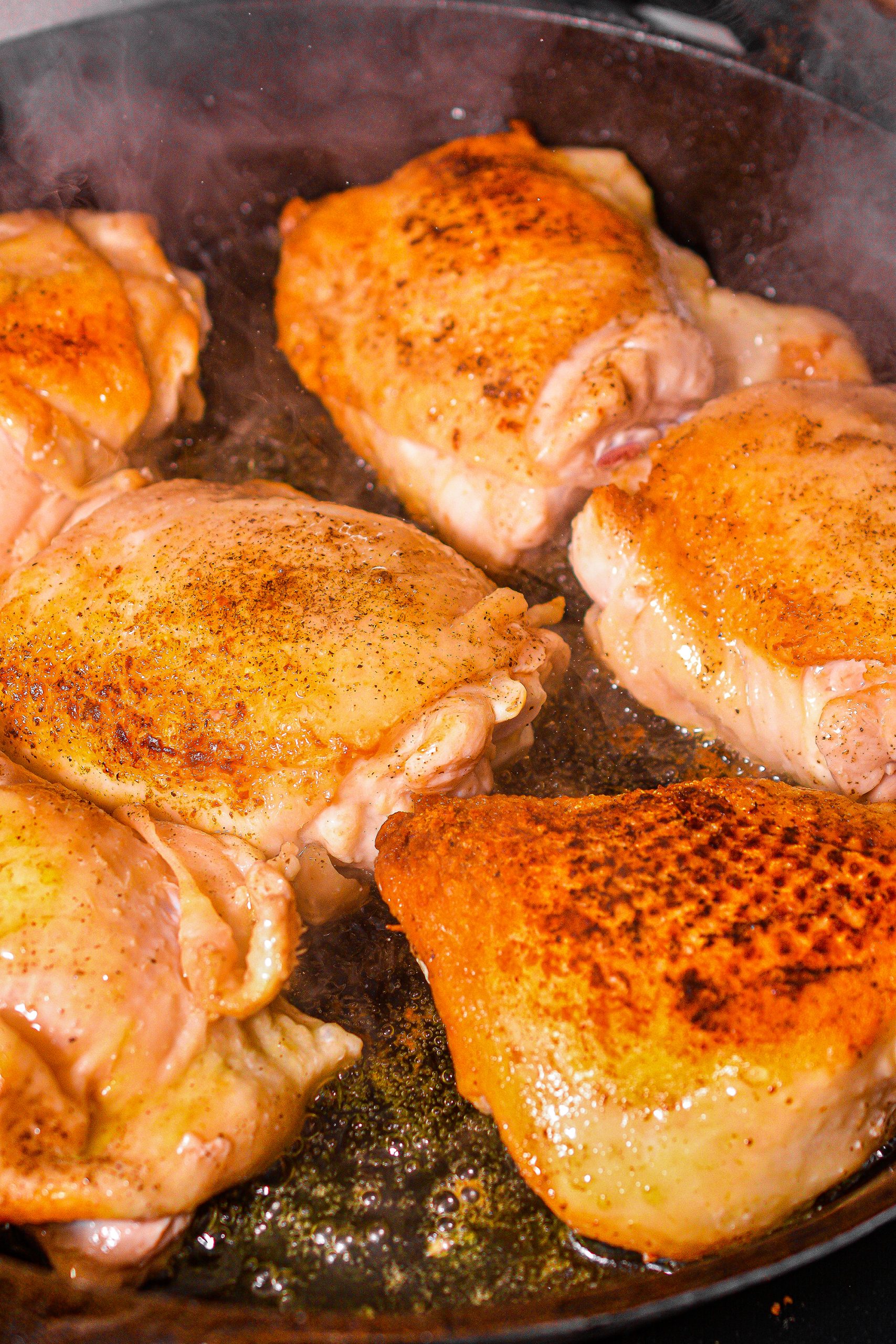 Add the chicken to the skillet and brown on both sides, then remove and set aside.