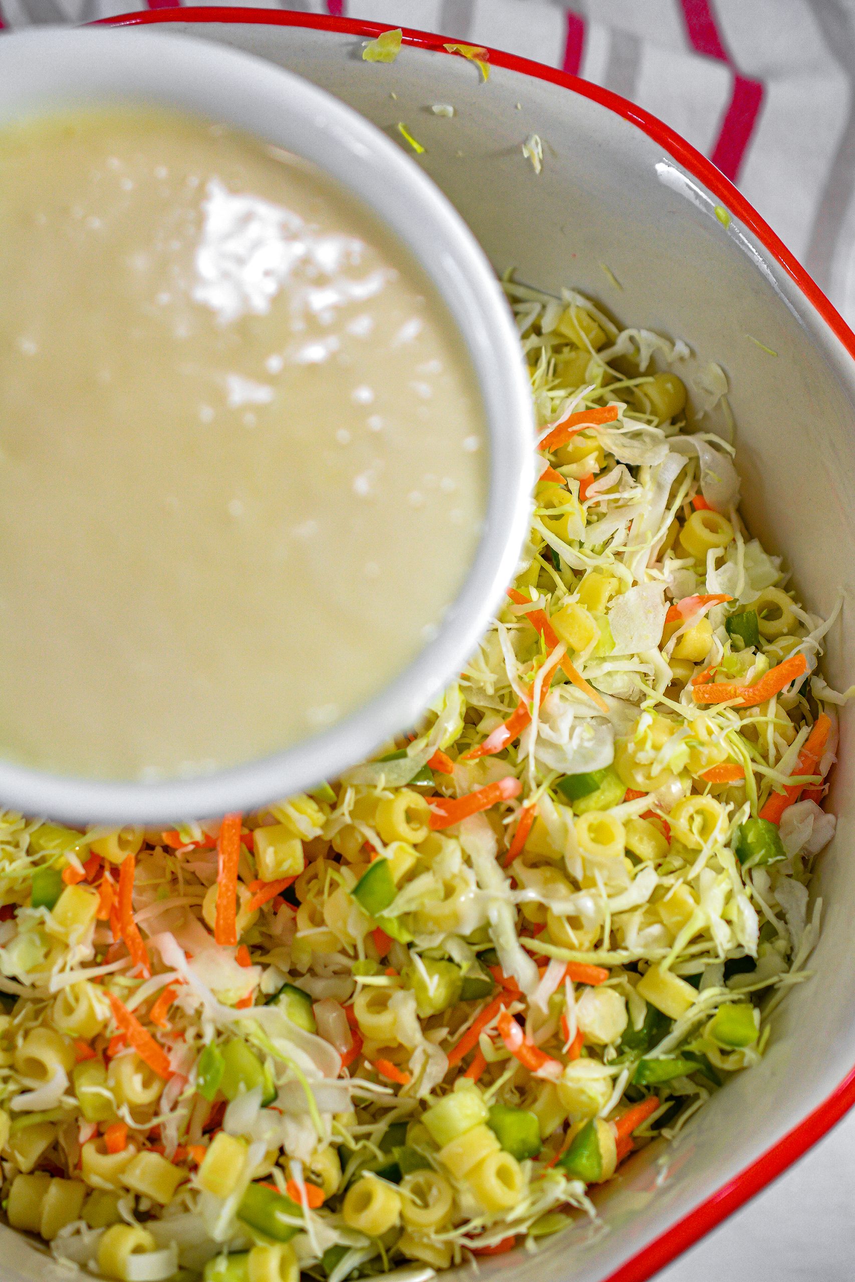 Pour the dressing mixture over the slaw, and toss to combine well.