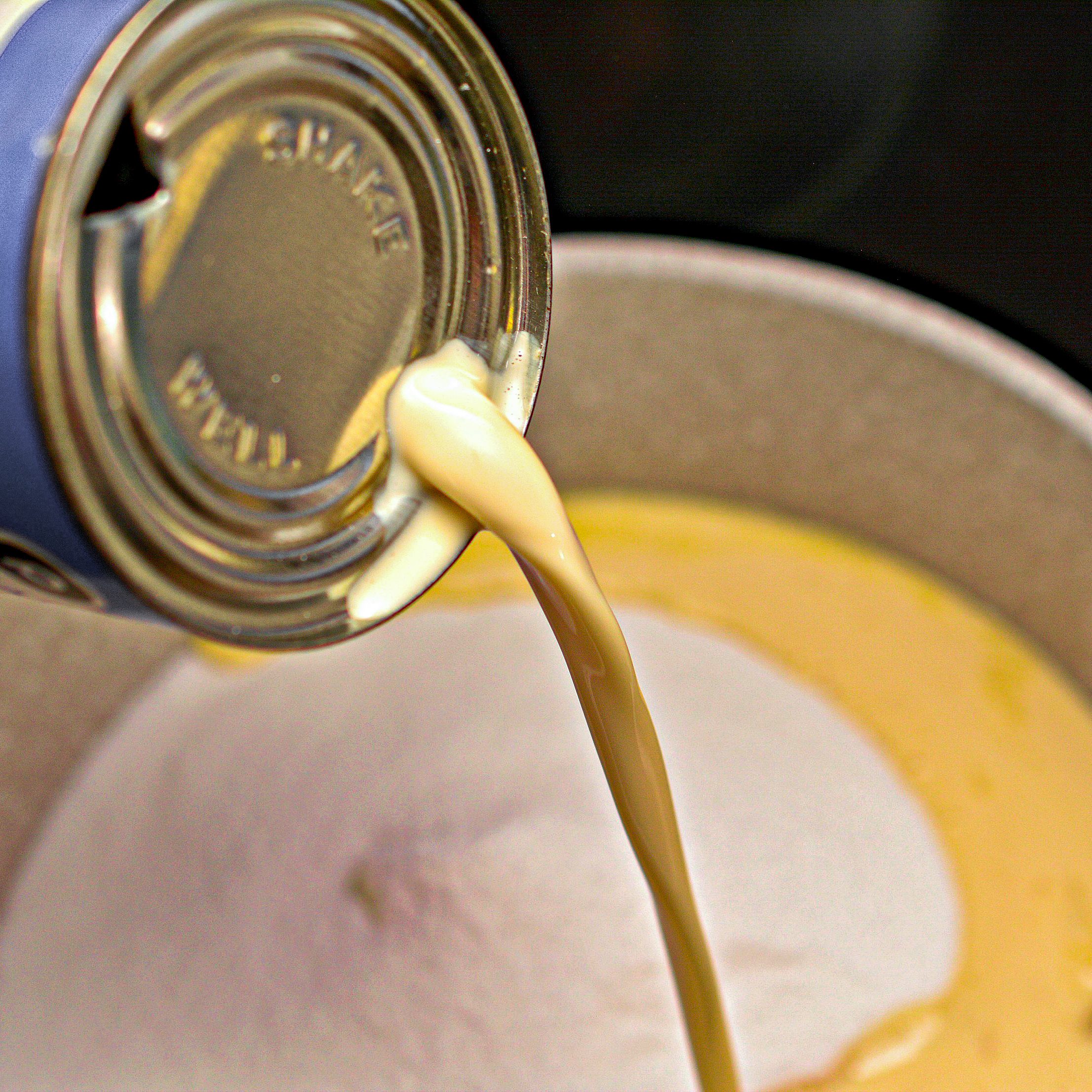 Add the butter, evaporated milk, and sugar to a saucepan over medium heat on the stove.