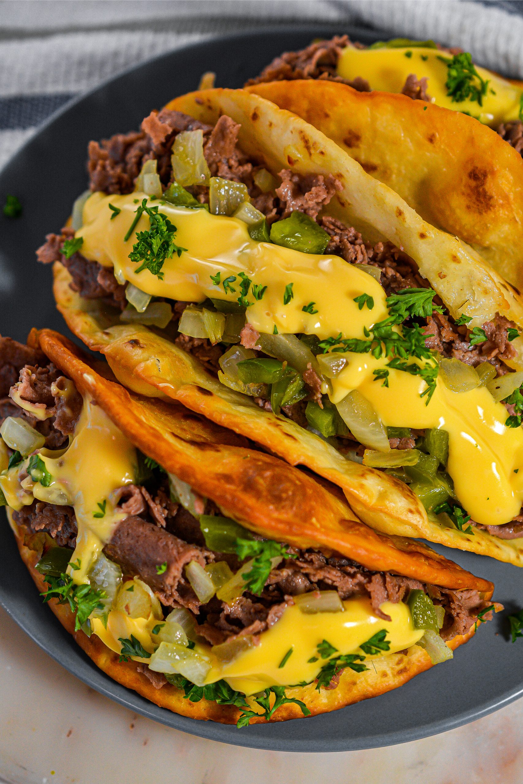 philly cheesesteak tacos, philly cheese steak tacos, cheese steak tacos