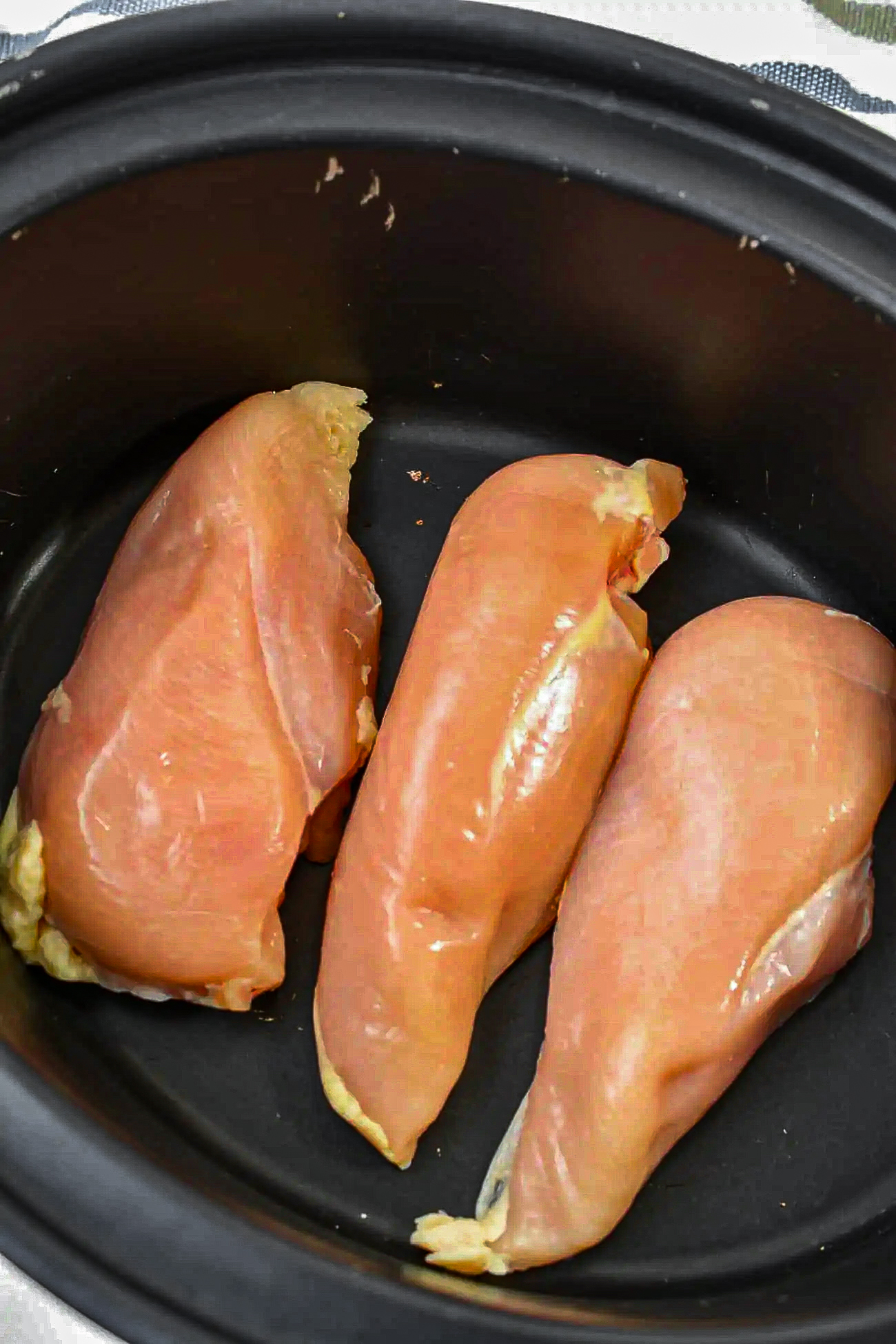 Placing chicken breasts