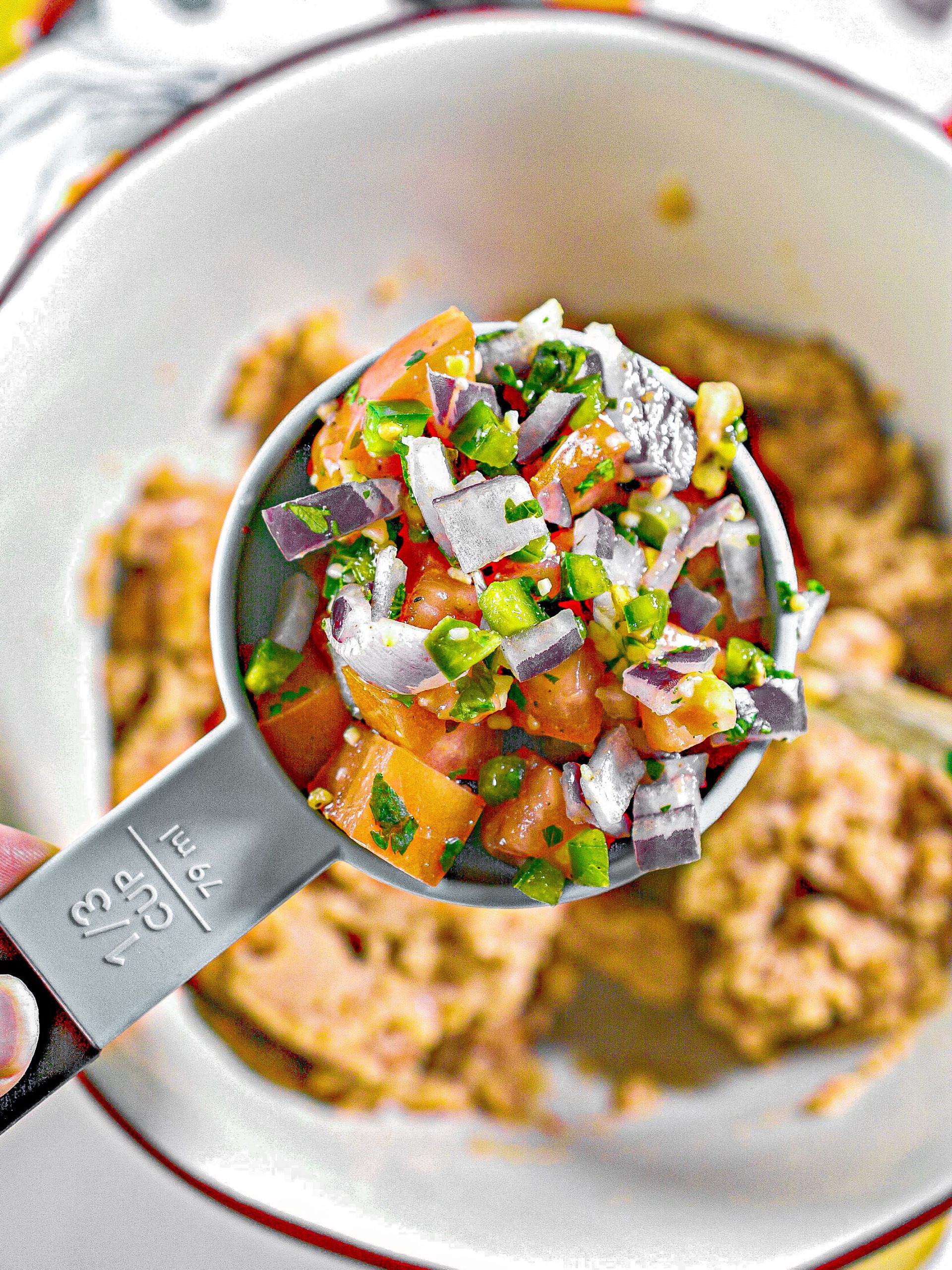 Combine the refried beans and pico de gallo or salsa in a bowl, and stir to combine.