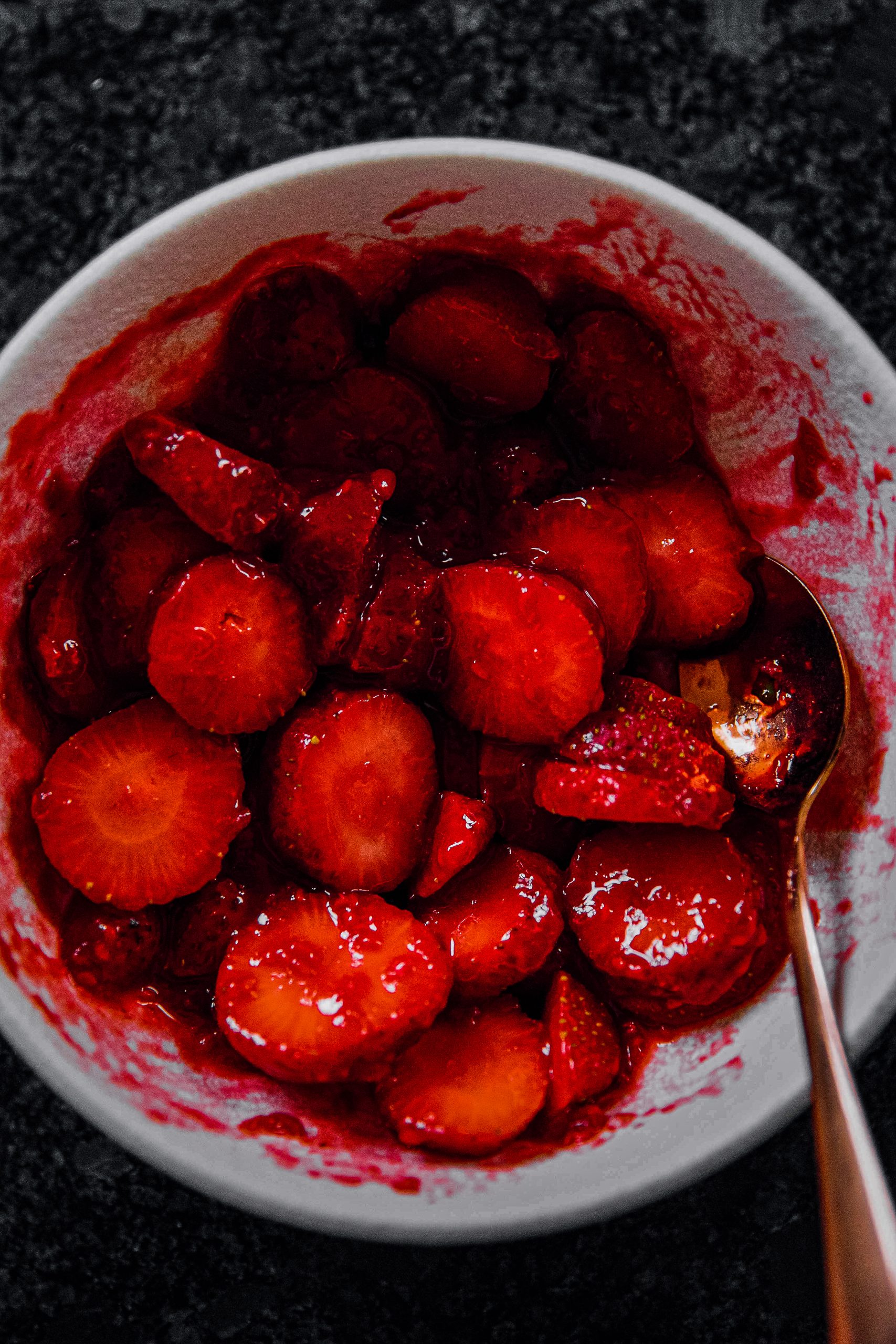 Toss together until strawberries are  fully coated