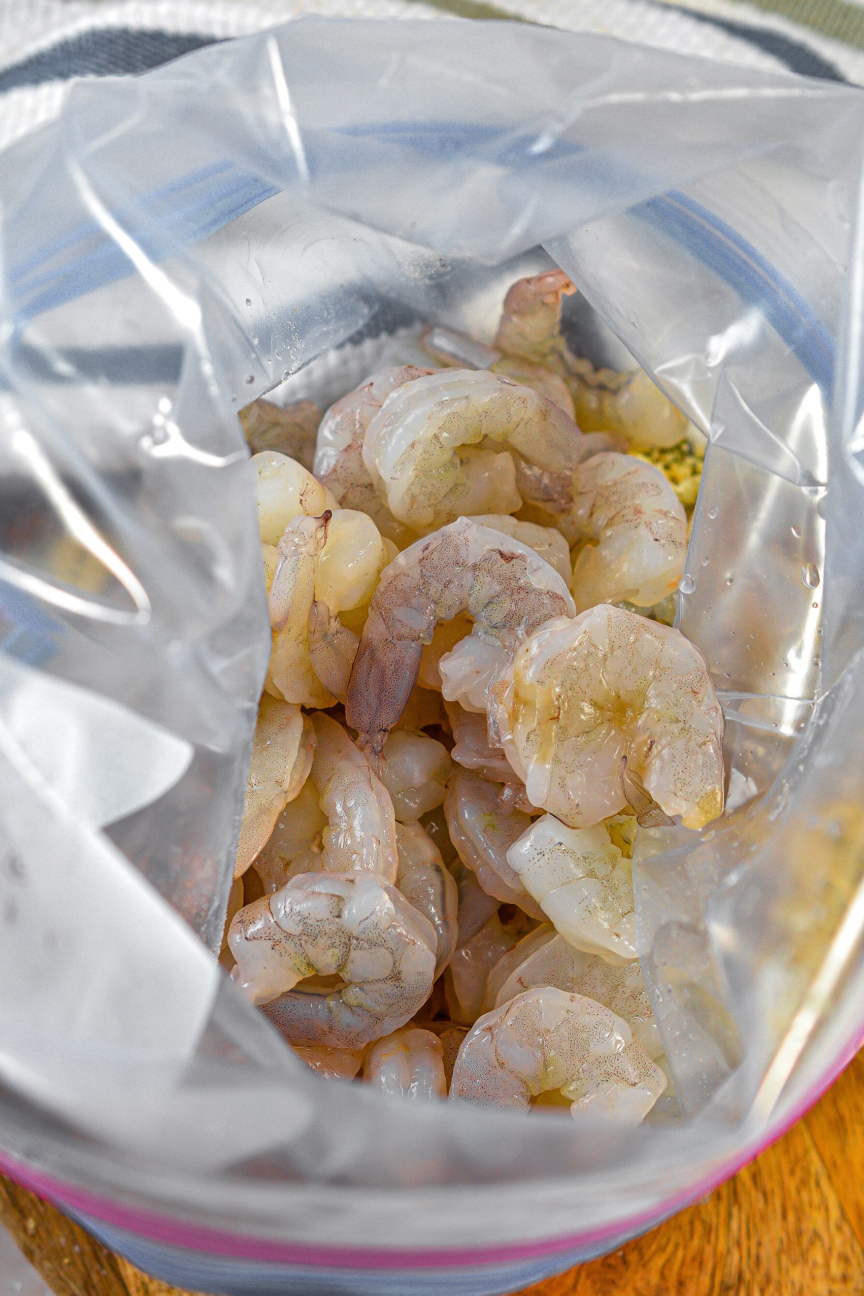 Place the shrimp into the Ziploc bag, and shake to coat in the mixture.