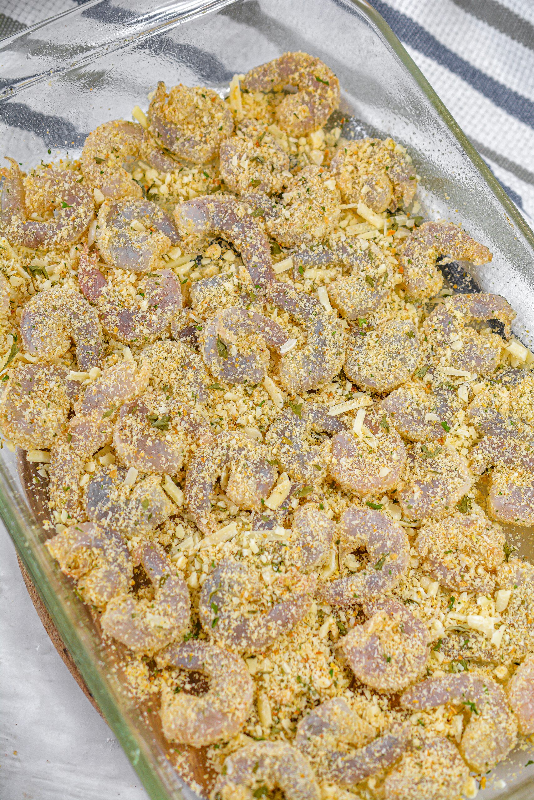 Layer the coated shrimp in a well greased 9x13 casserole dish.