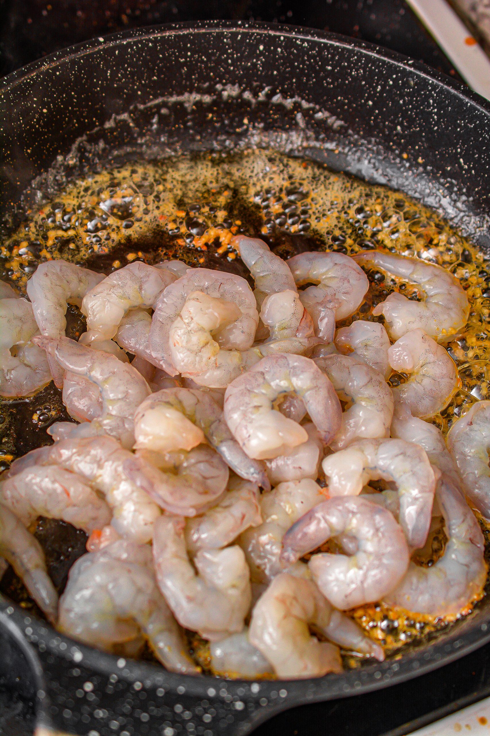 Add the shrimp to the skillet and saute for 2 minutes.