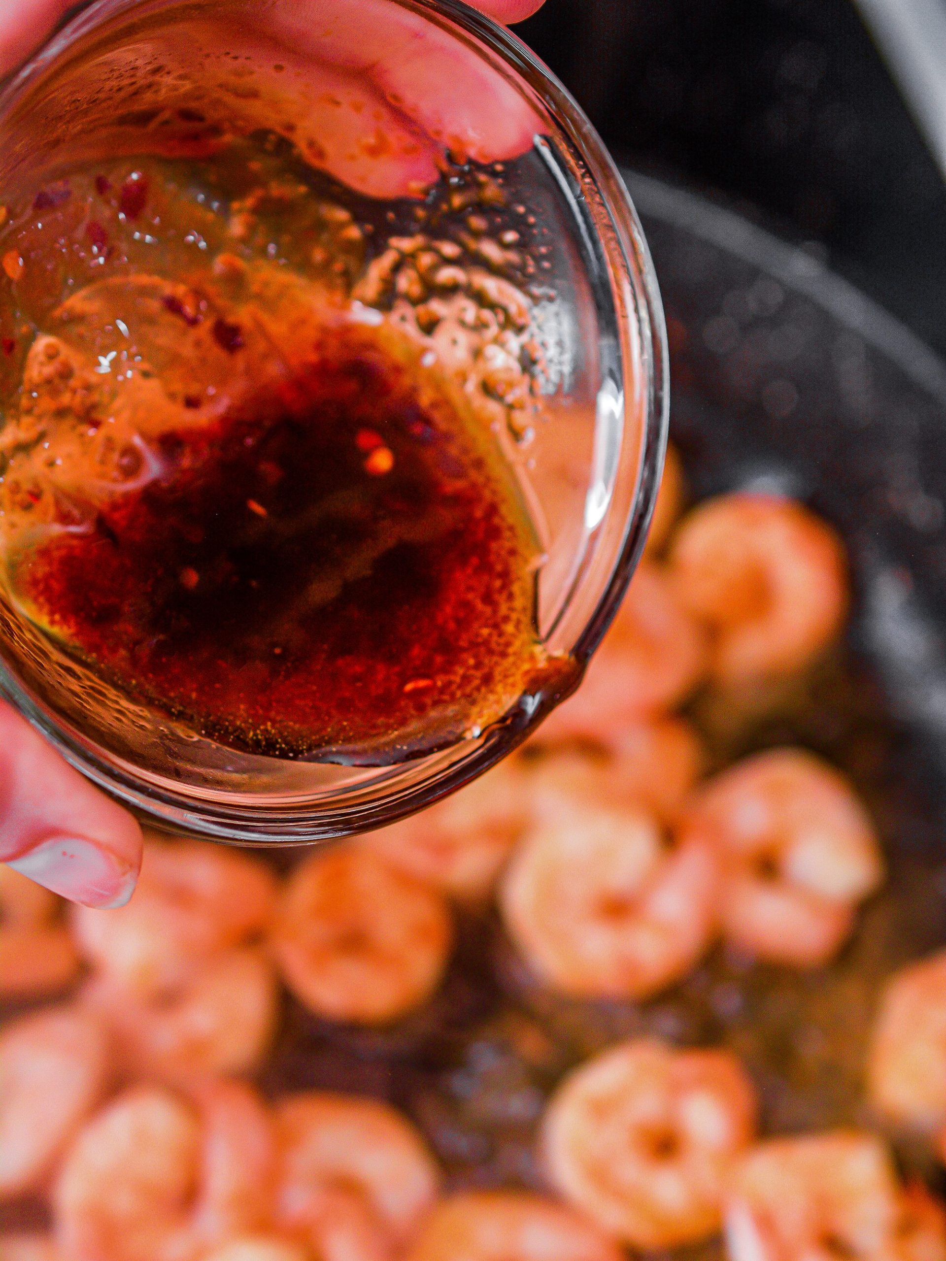 Pour the sauce mixture over the shrimp and saute for 2 minutes longer.