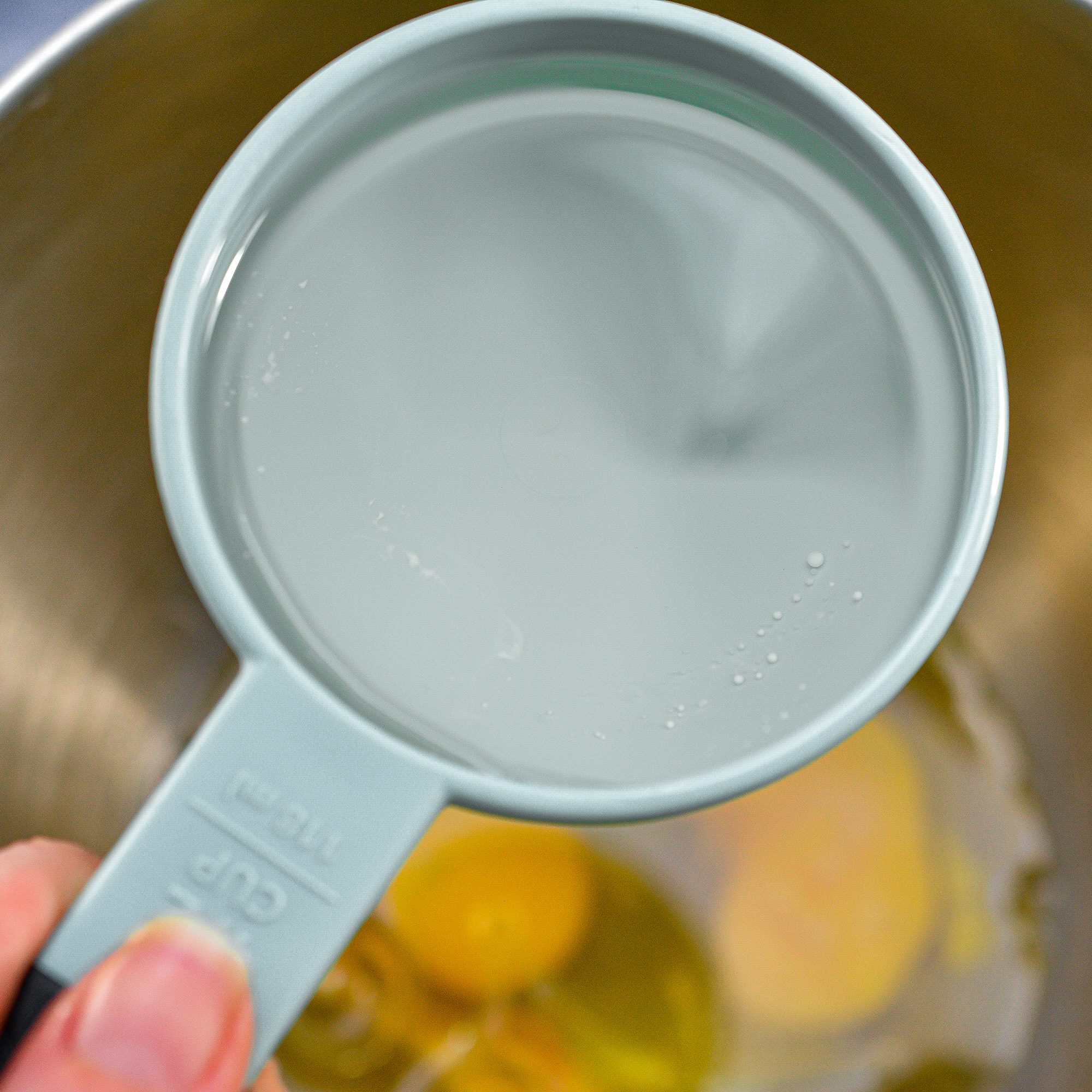 Mix together the oil, eggs, and sugar for the cake until well blended, then stir in the vanilla extract.