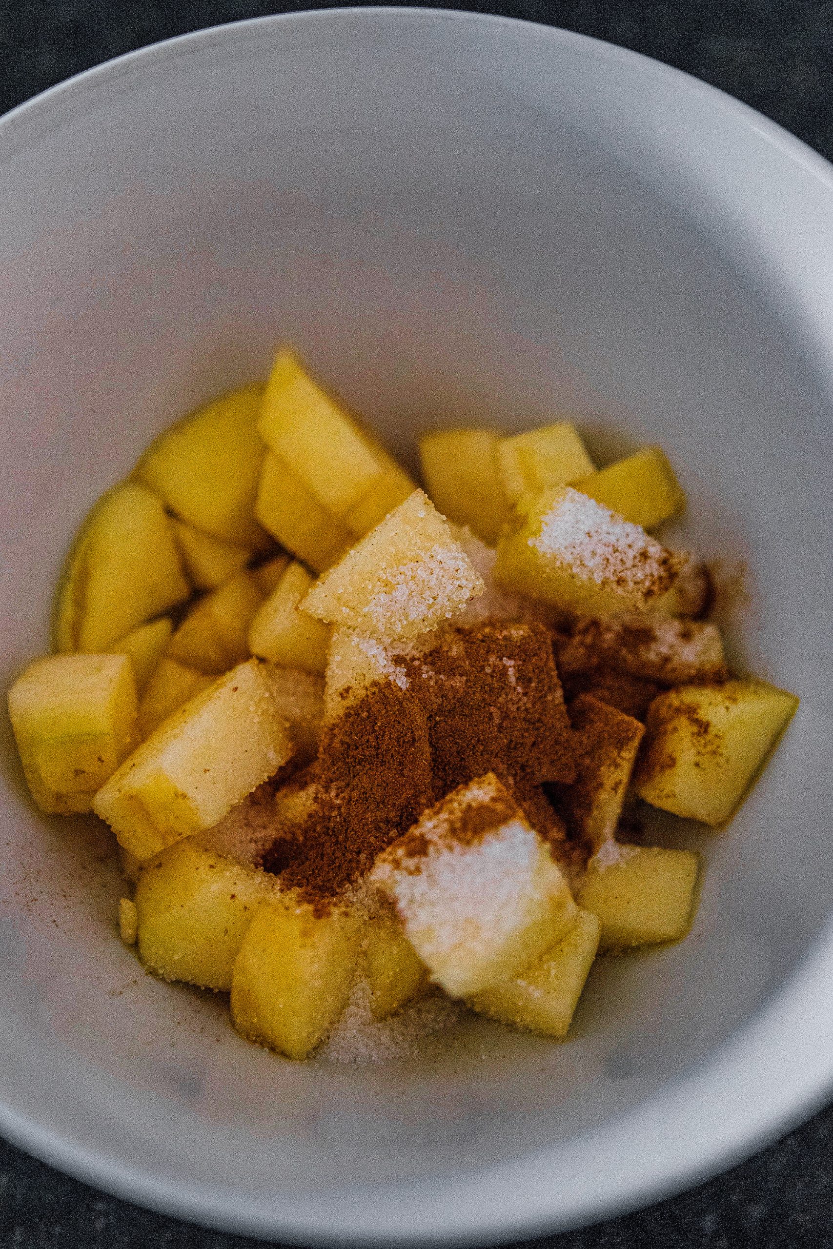 In a medium bowl, toss together diced apple, sugar, cinnamon and lemon juice together. Allow to sit for 10 minutes.