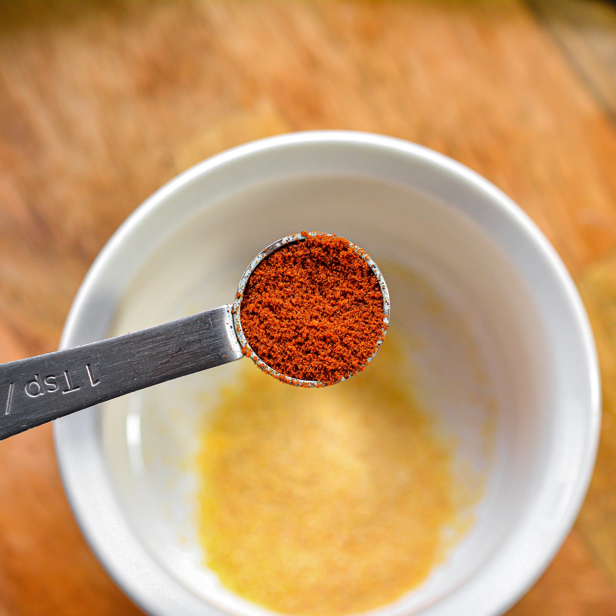 In a small bowl, combine the Italian seasoning, garlic powder, paprika and salt and pepper to taste.