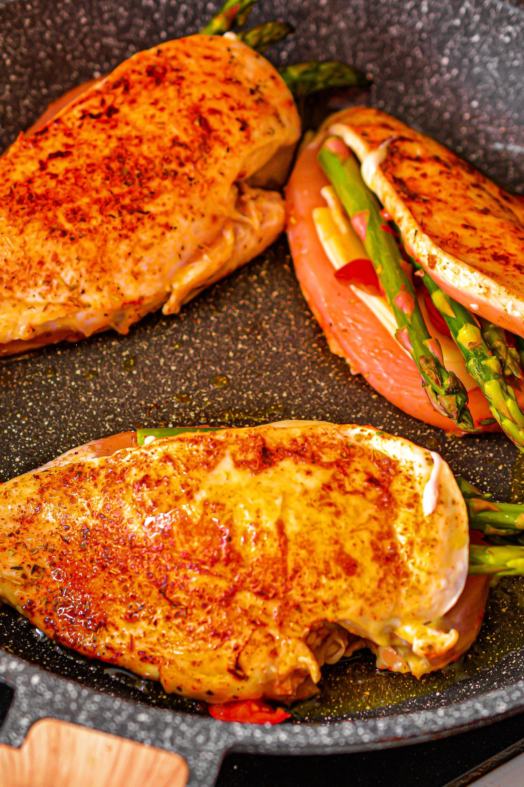 Sear both sides of the chicken breasts and transfer them to a baking sheet.