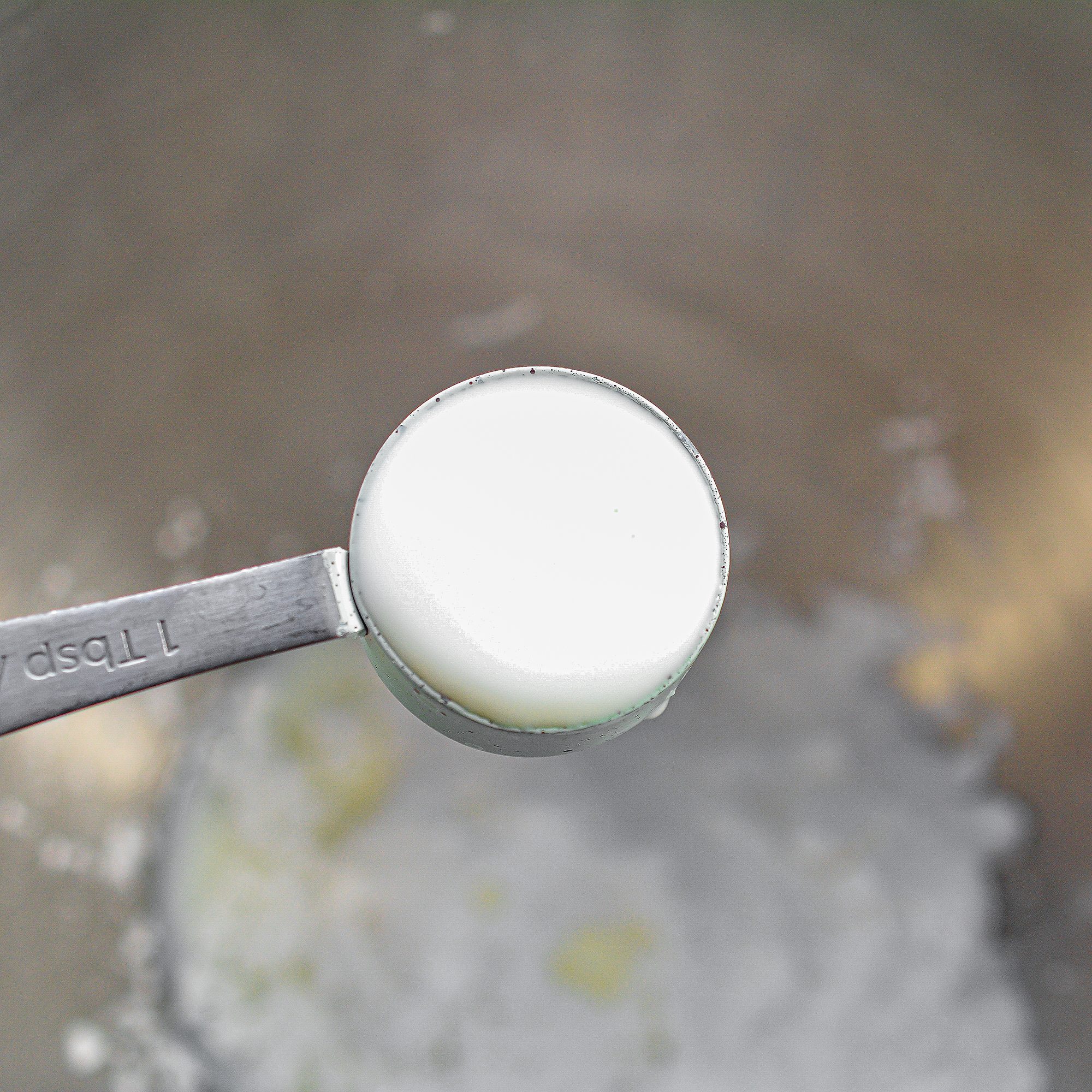 In a bowl, combine the powdered sugar, milk and vanilla until smooth.
