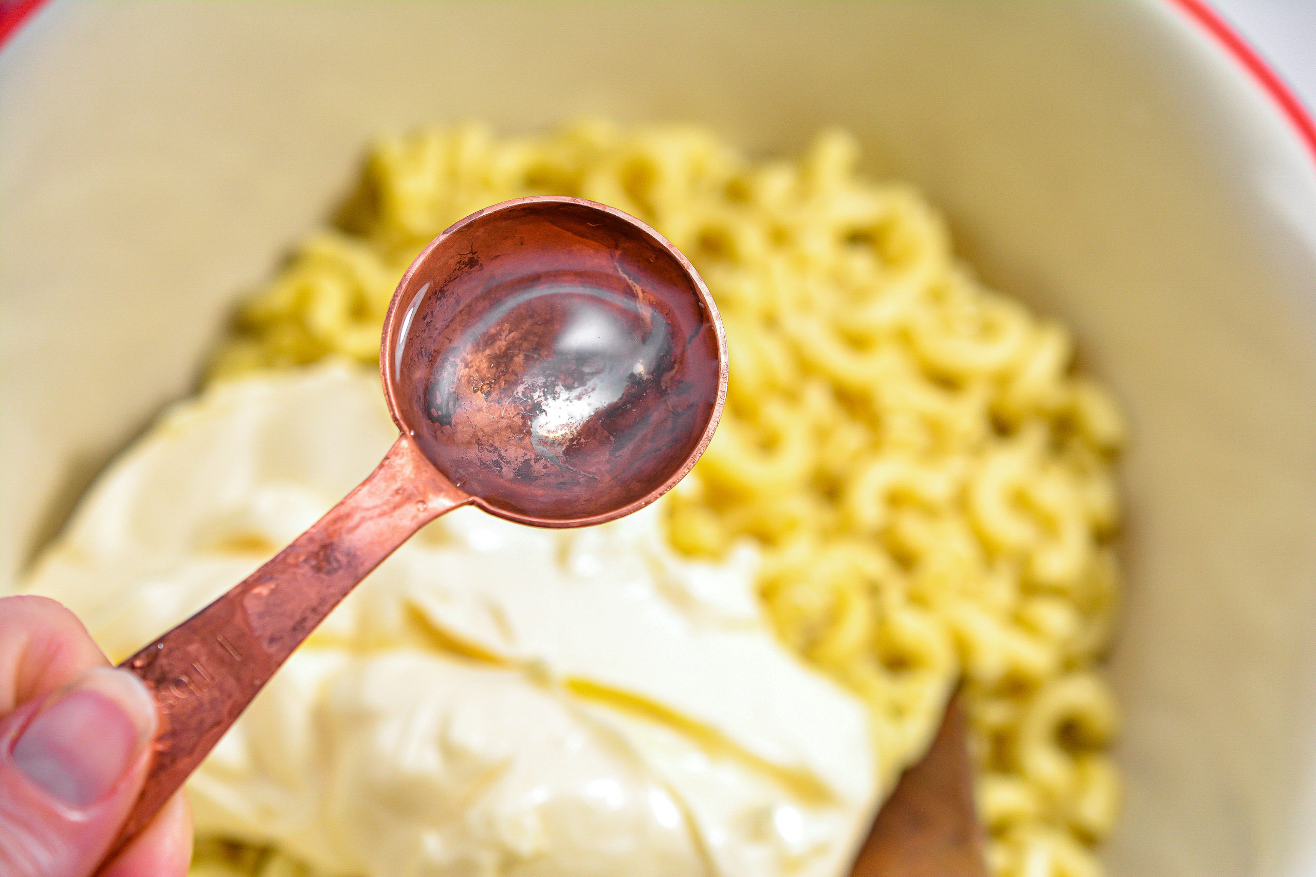 Place the noodles into a large mixing bowl and add in the remaining ingredients. Stir to combine well.
