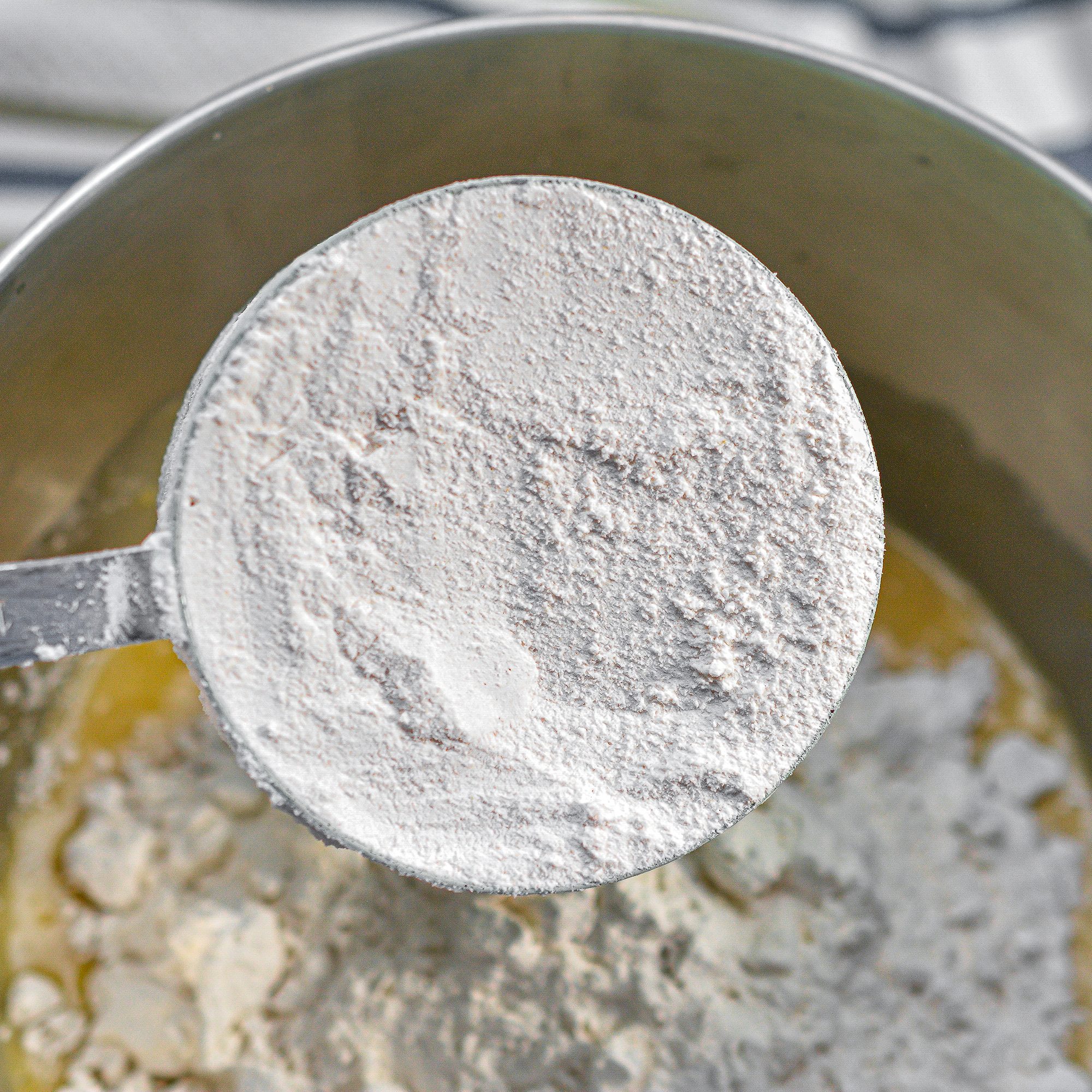 Place the flour, baking soda, baking powder and salt in the mixing bowl and beat until a smooth batter has formed.