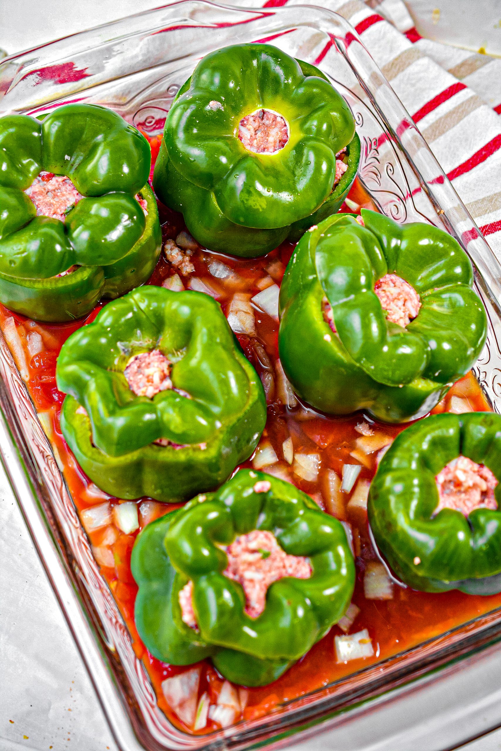Fill each pepper with a heaping portion of the meat filling and place the tops back on them.