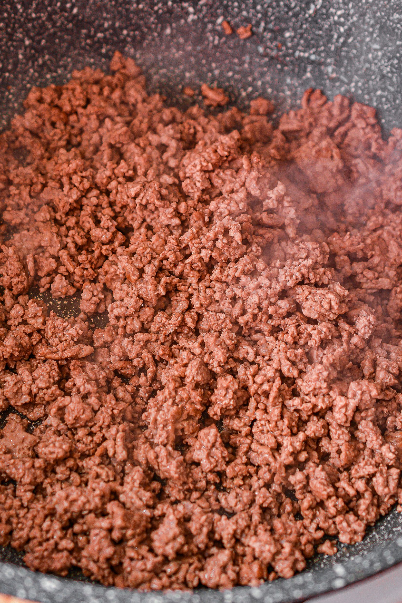  Cook the ground beef over medium-high heat until completely browned. Drain any excess grease.