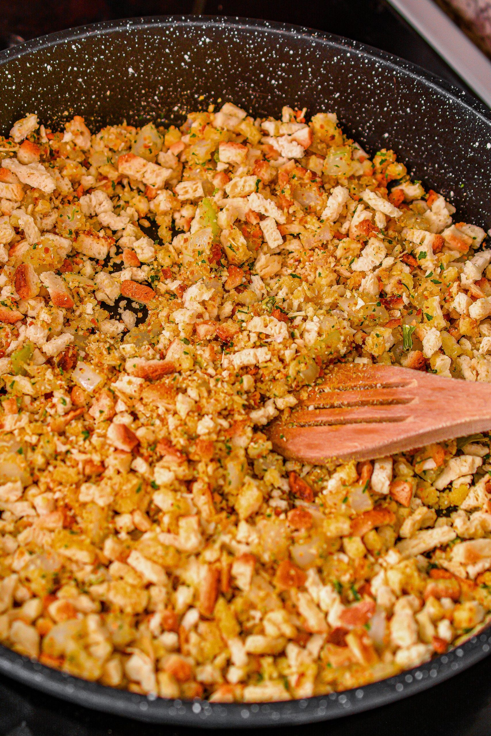 Place the onions and stuffing in the pan, and saute until the onions begin to soften.