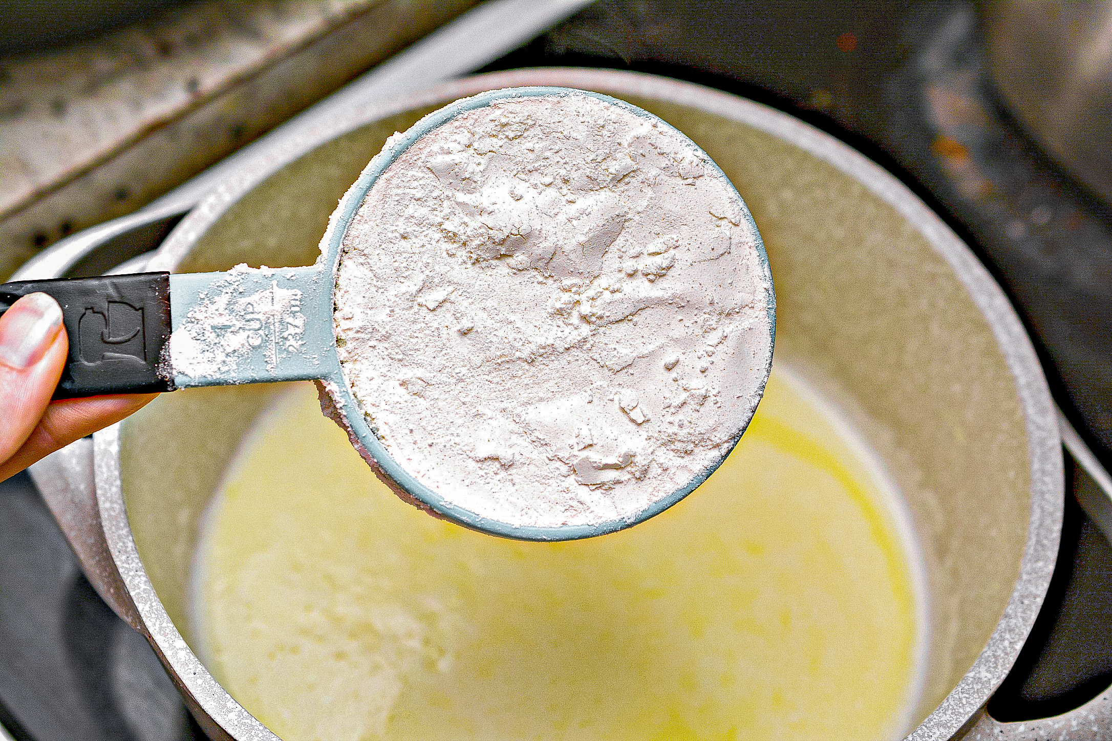 Remove the saucepan from the heat, and quickly stir in the flour until completely combined and smooth.