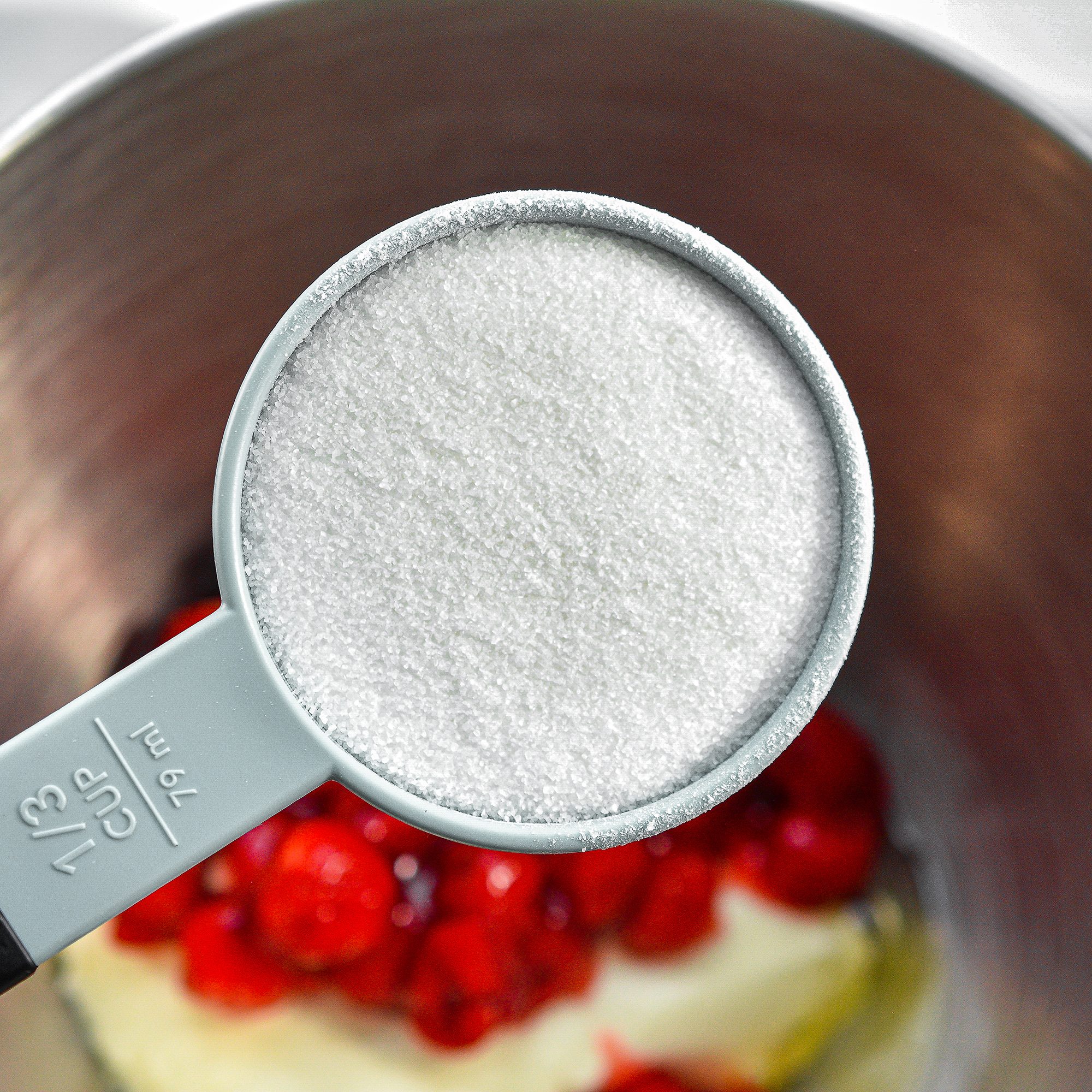 In a mixing bowl, combine the cream cheese, ⅓ cup sugar, 