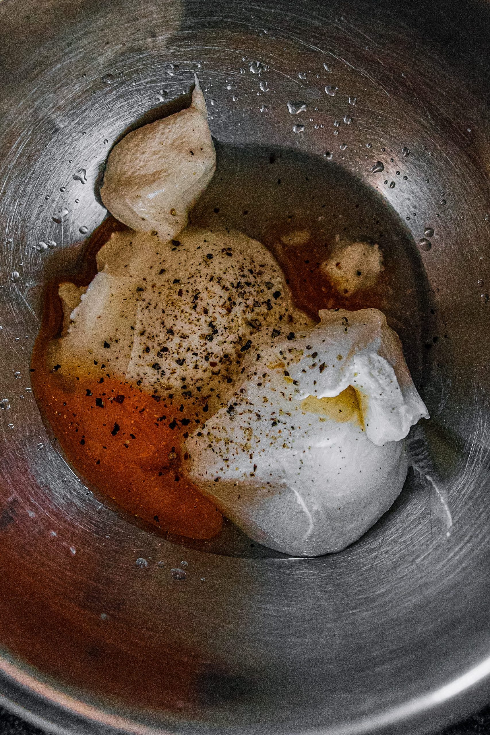 In a bowl, combine sour cream, egg yolks, pimento, cooking wine, salt and pepper. Set aside.