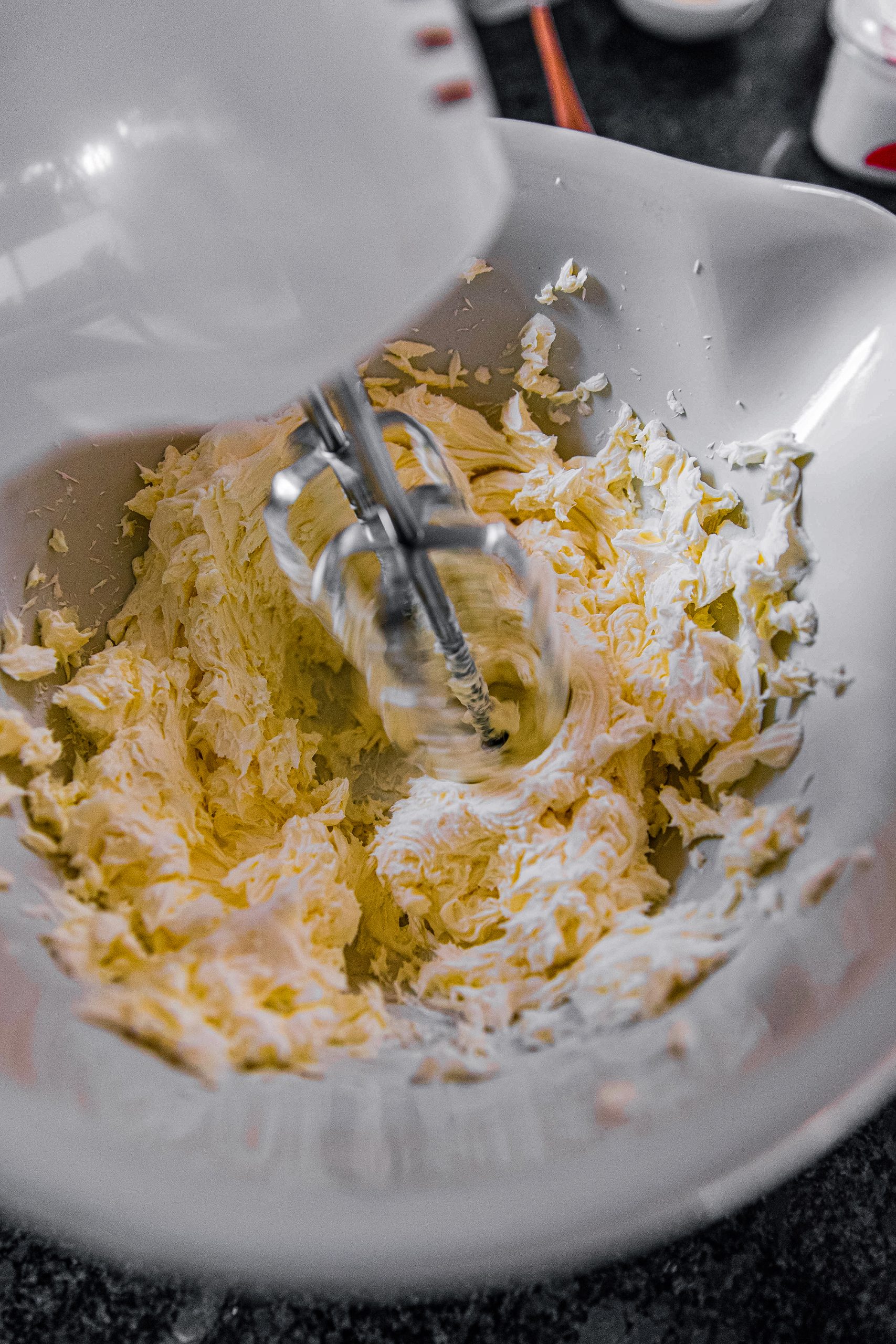 Grab a large mixing bowl, and add in cream cheese