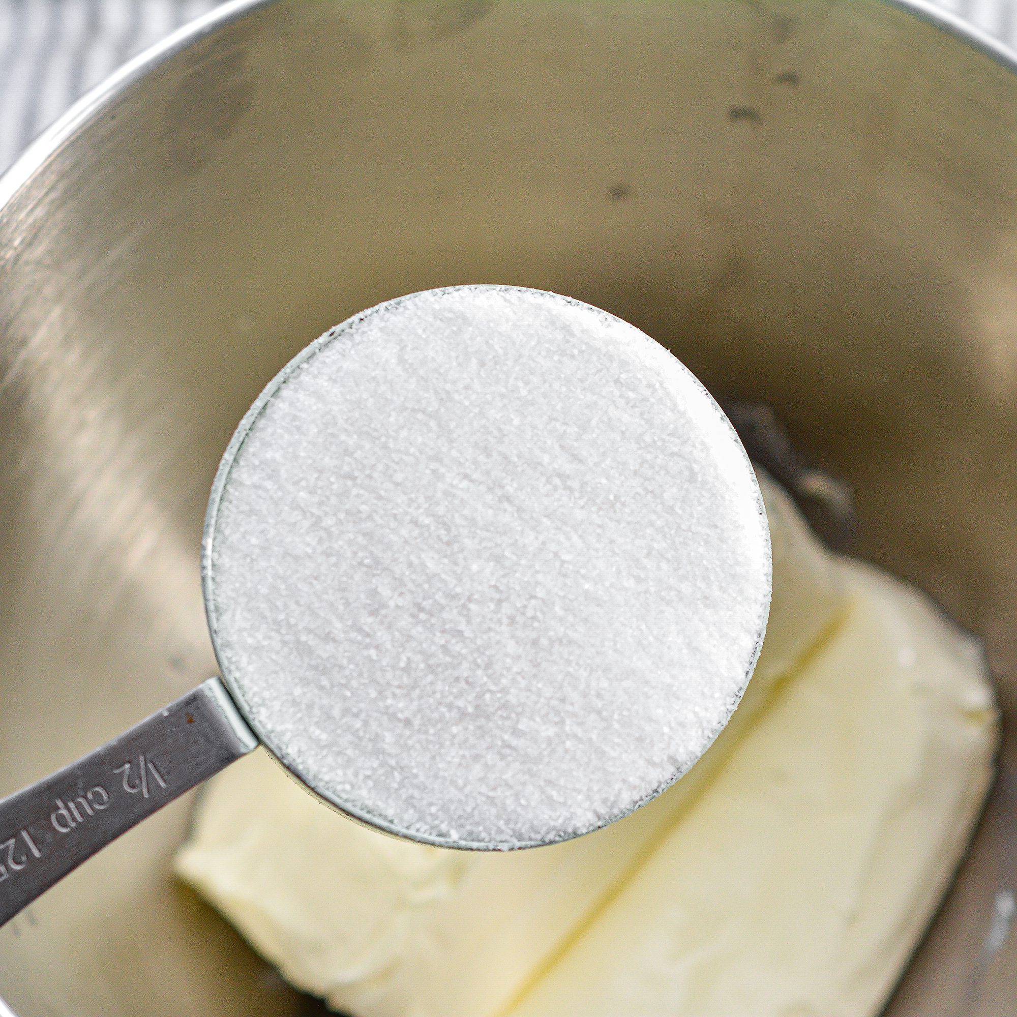 Beat together the cream cheese and ½ cup sugar until smooth.