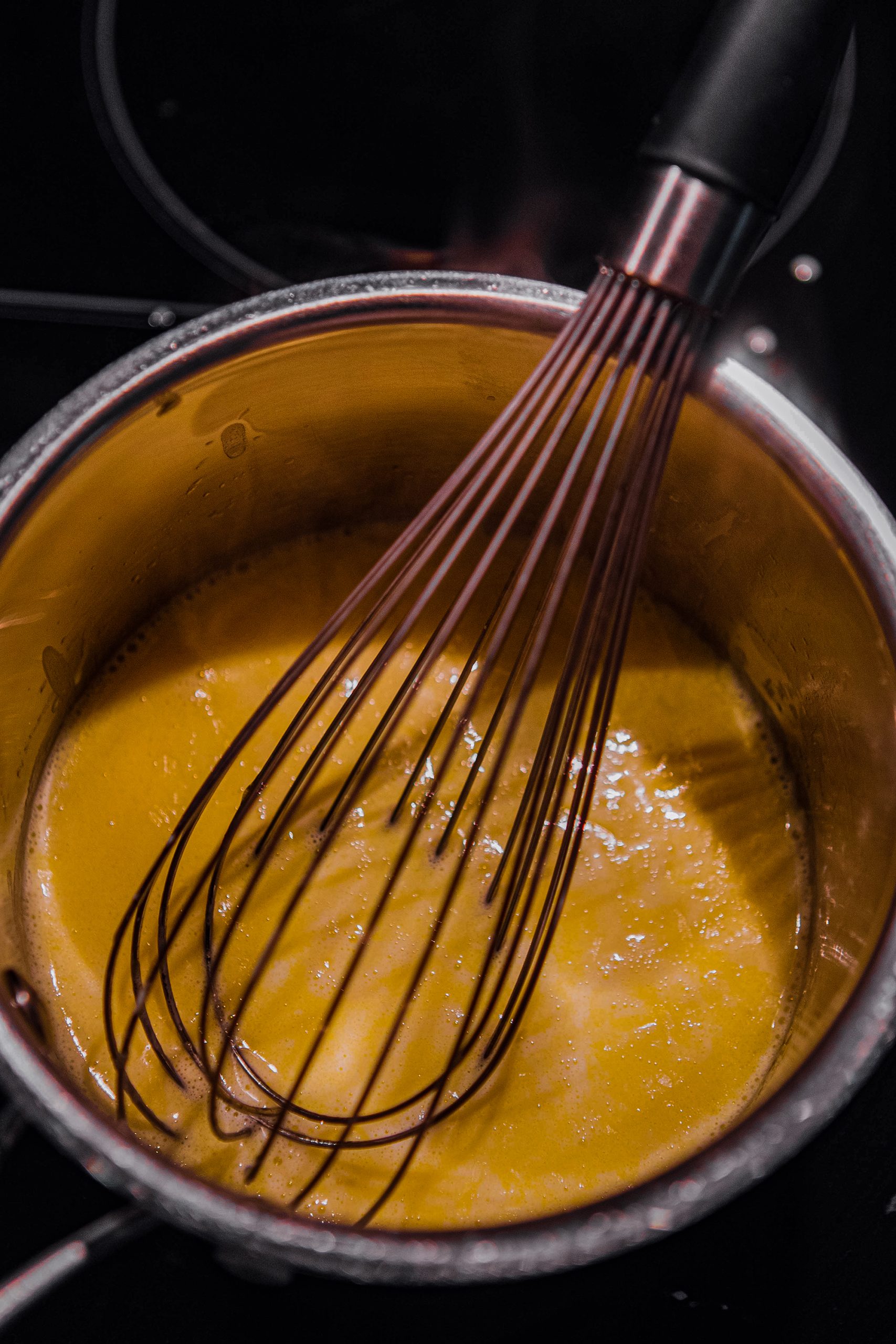 Whisk in the parmesan cheese and stir continuously until cheese has melted. 