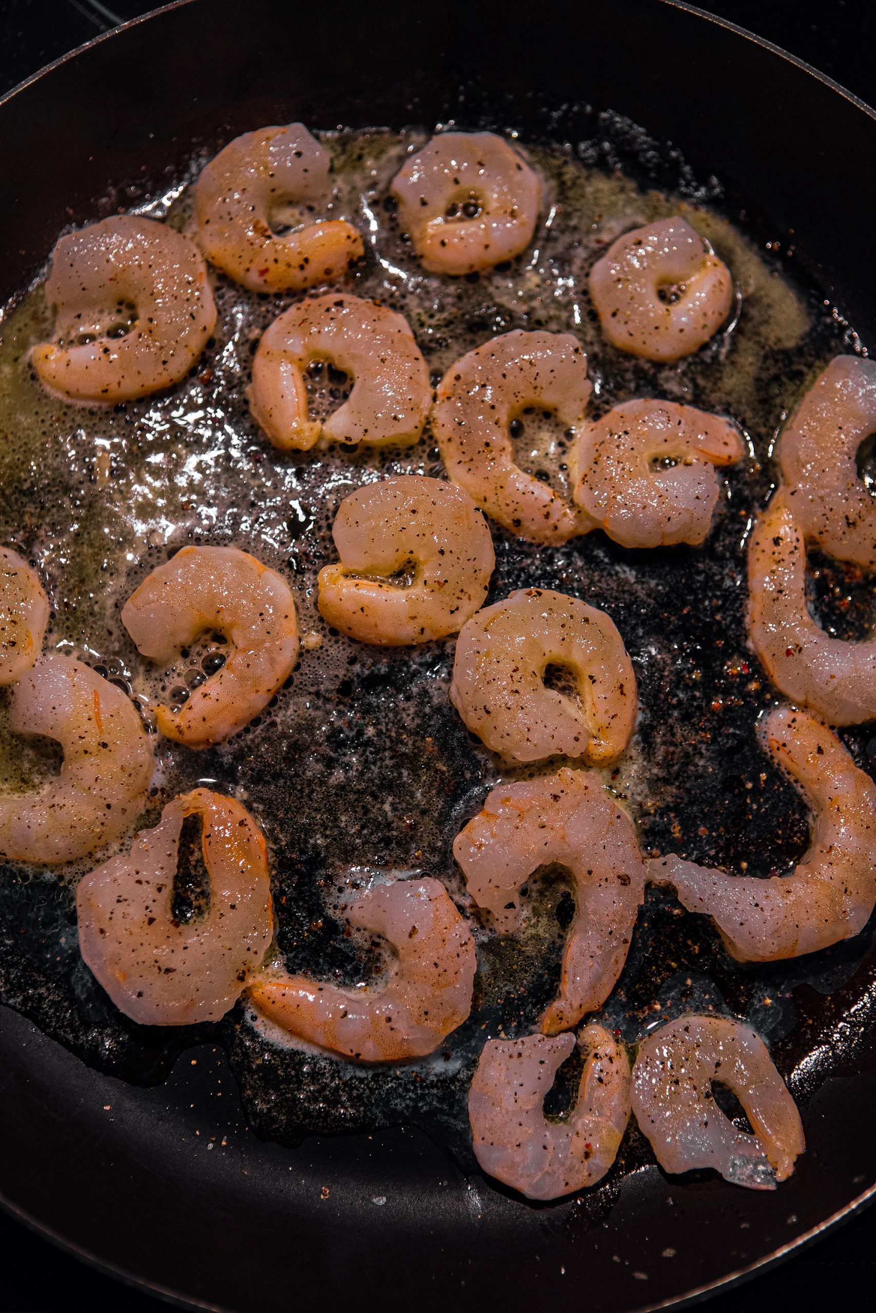 Add the shrimp to and season with salt and pepper. 