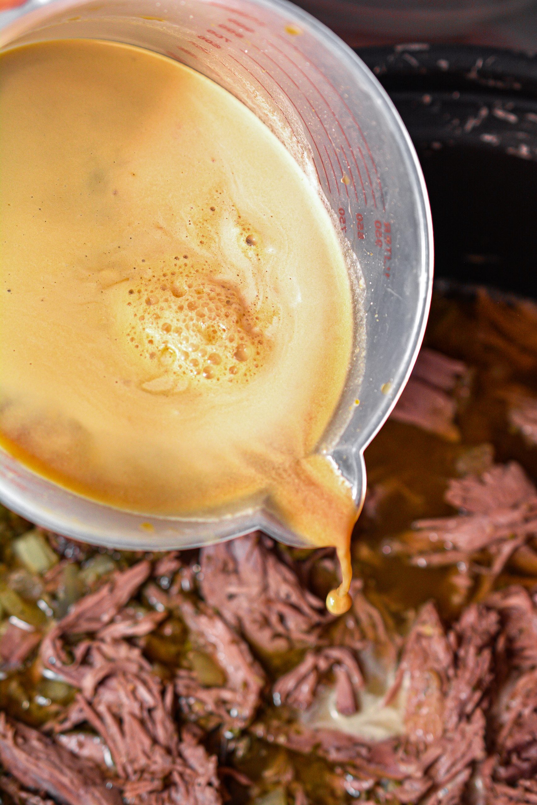 Pour the gravy into the Crockpot, replace the lid and cook on low for an additional hour.