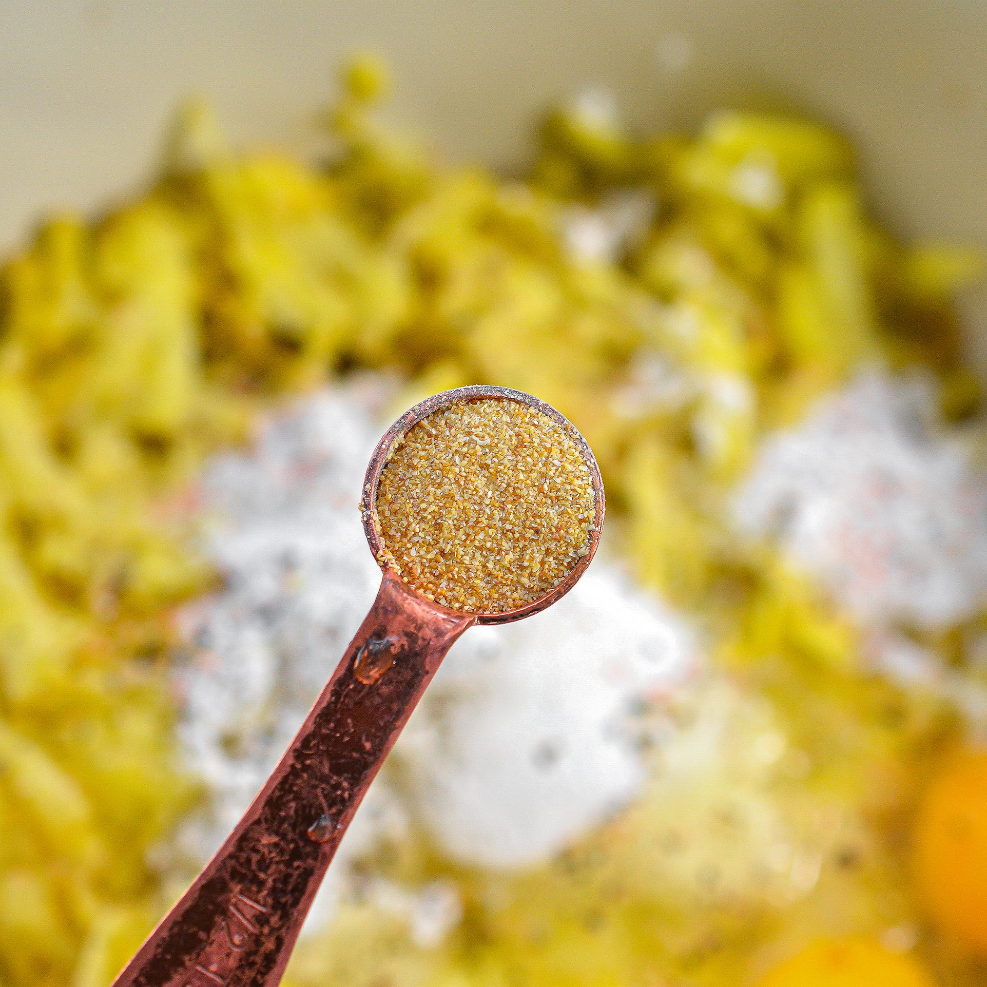 In a large mixing bowl, combine the shredded potato, 3 eggs, ½ cup flour, garlic powder, and salt and pepper to taste.